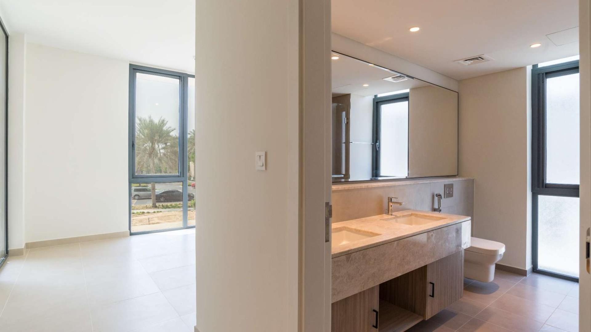 Spacious living area with large windows in 4-bedroom villa, Dubai Hills Estate