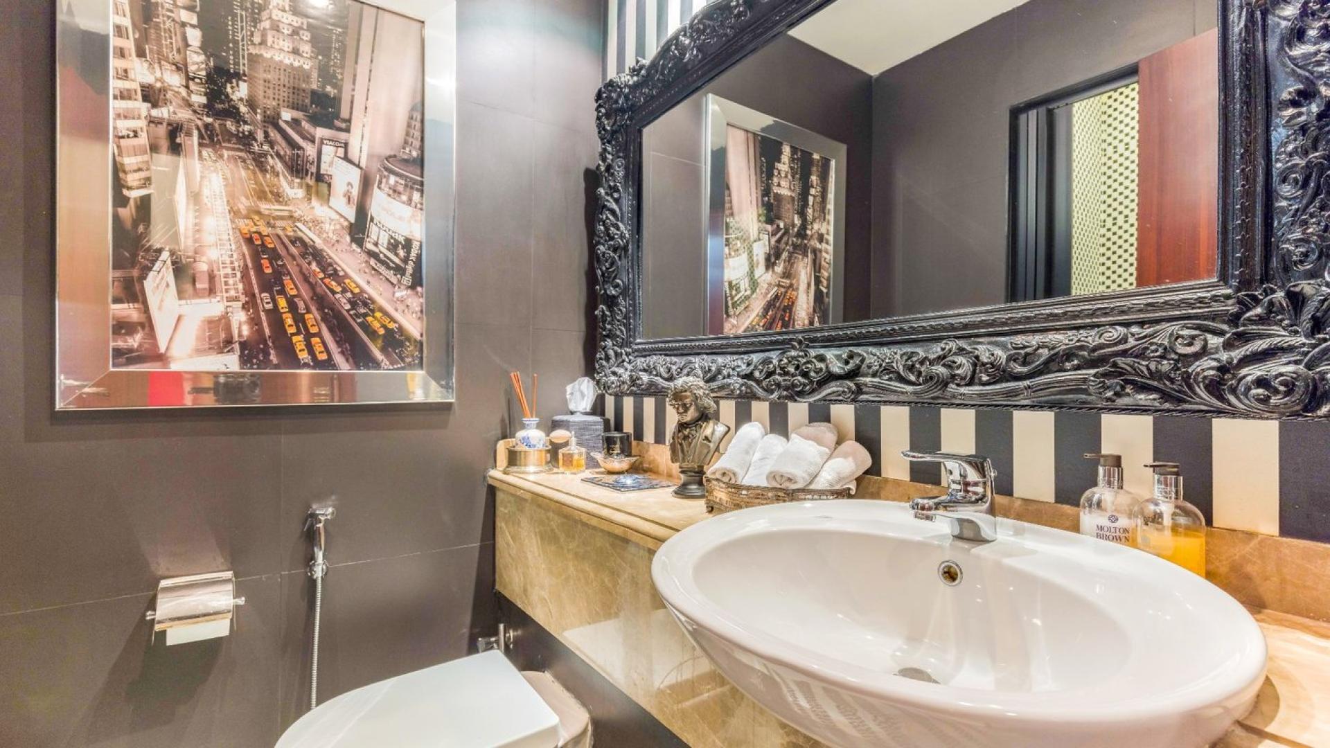 Beautiful garden view of a villa in Saheel, Arabian Ranches, with lush greenery