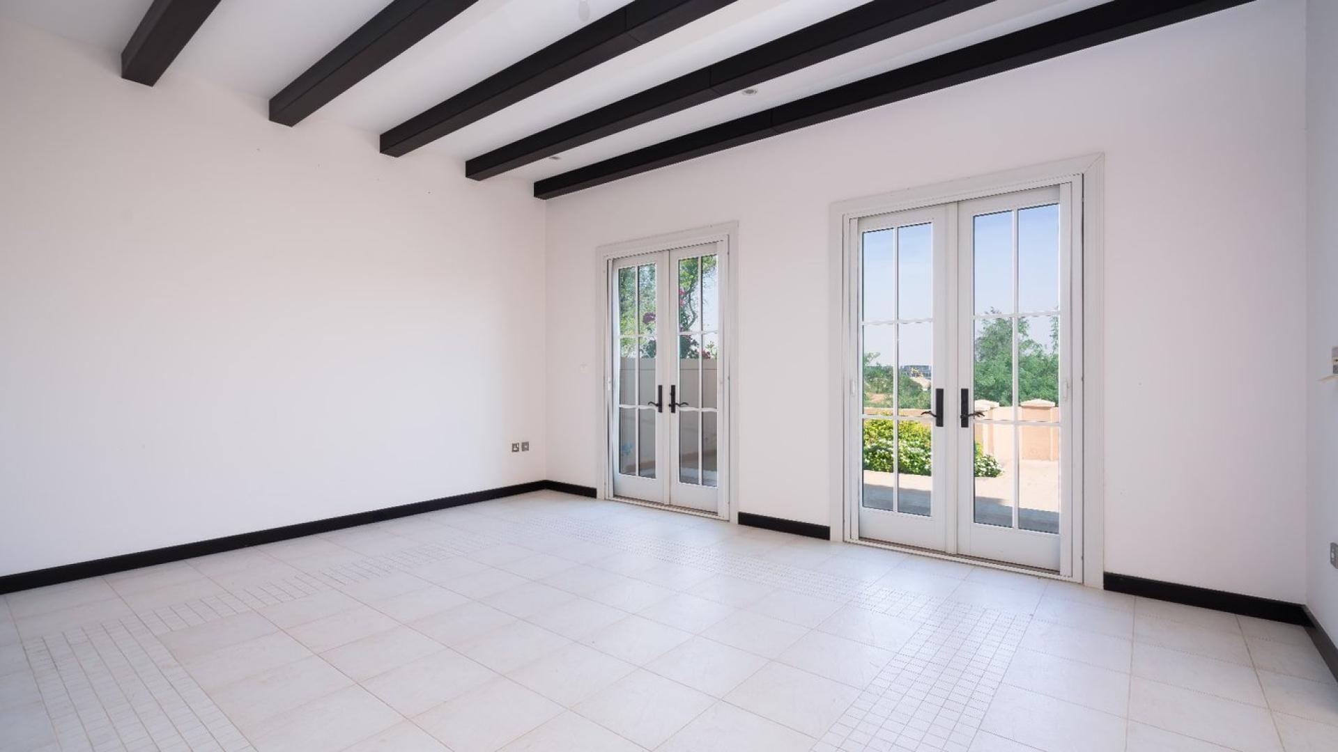 Bright interior of Muirfield Type Villa with large windows, Jumeirah Golf Estates