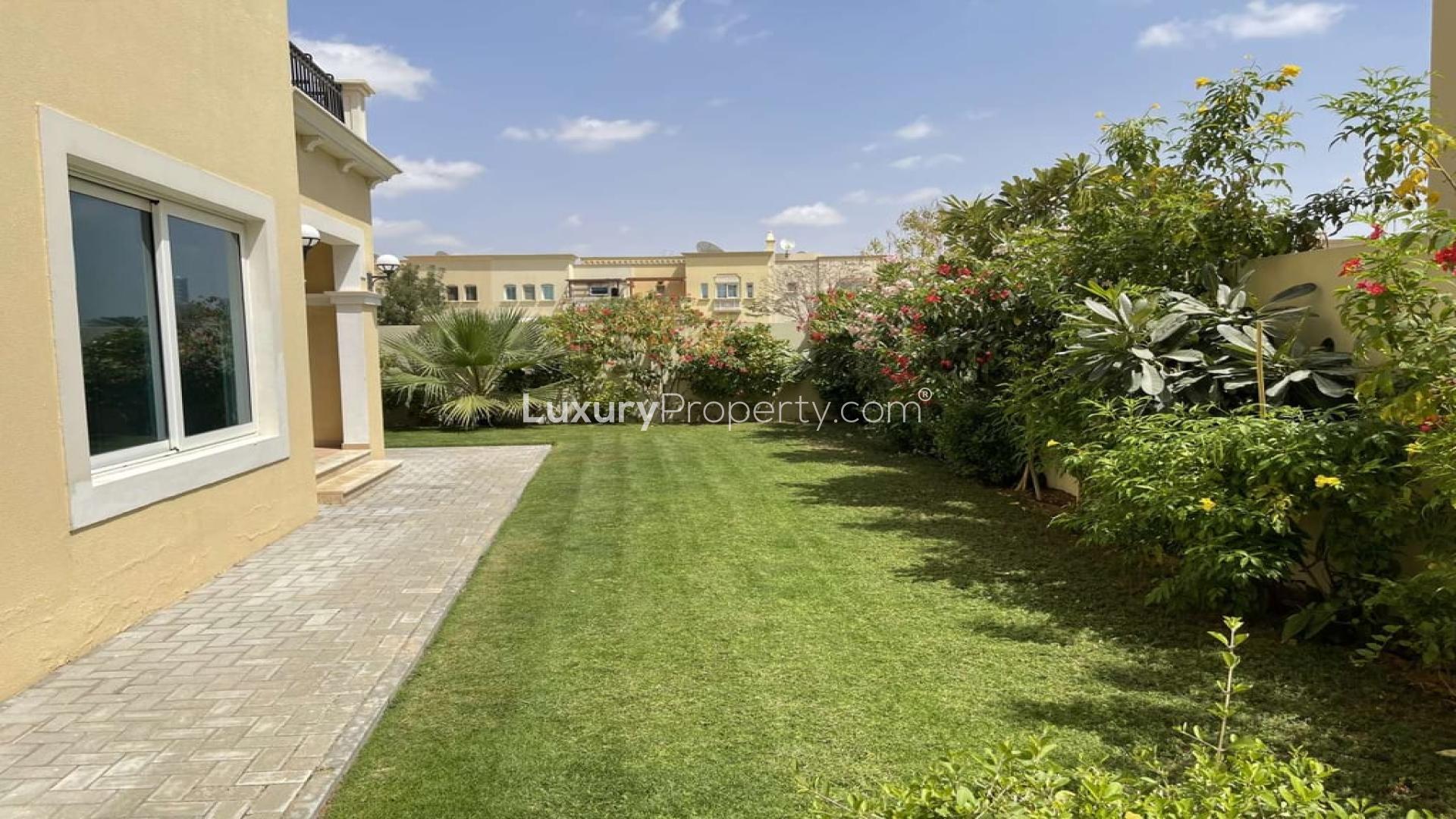 Spacious living room with garden view in Jumeirah Park Legacy Nova Villa for sale