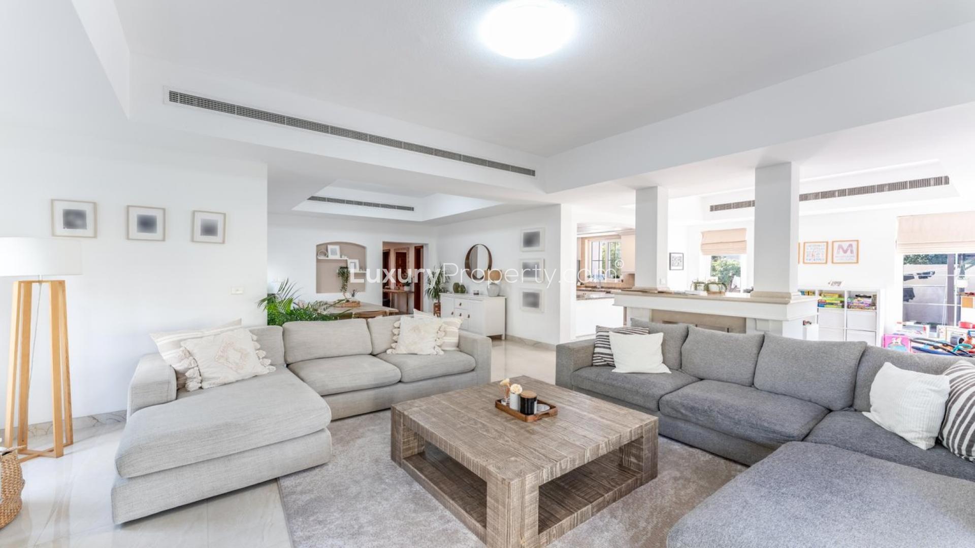 Spacious living room in Mirador villa, Arabian Ranches, featuring modern decor and natural light