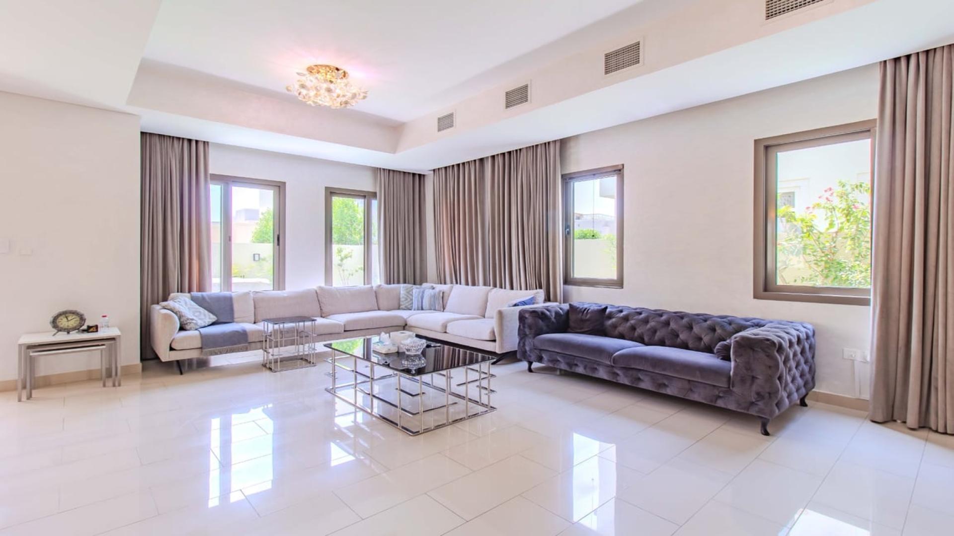 Spacious living room in upgraded Azalea villa, Arabian Ranches 2, featuring modern furnishings