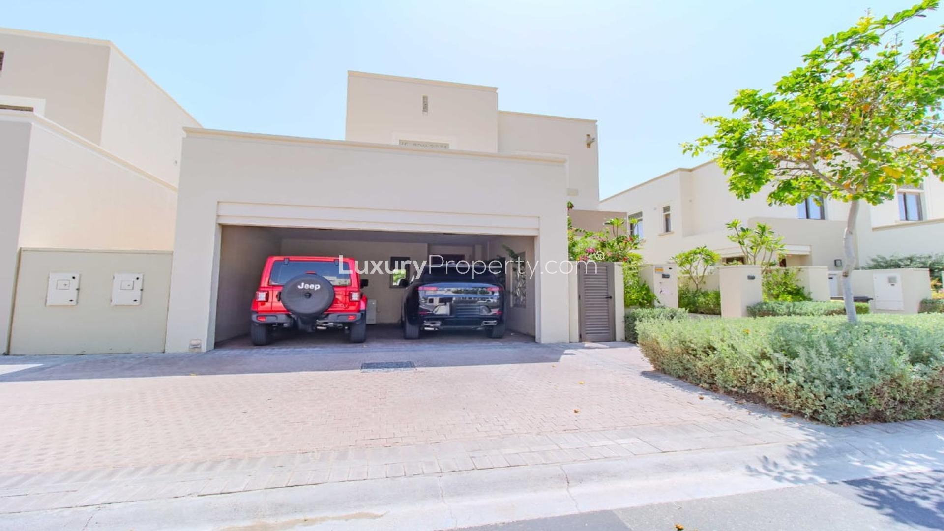 Front view of a modern villa with garage in Azalea, Arabian Ranches 2