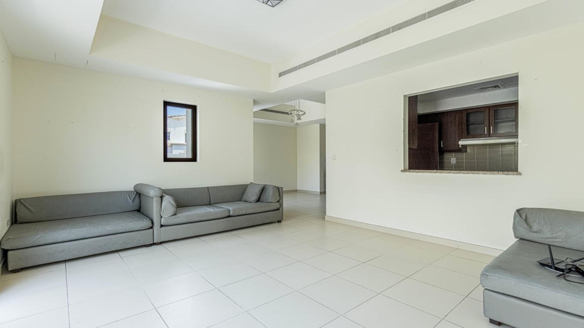 Corner unit villa in Mira, Reem with garage, landscaped garden, and modern facade