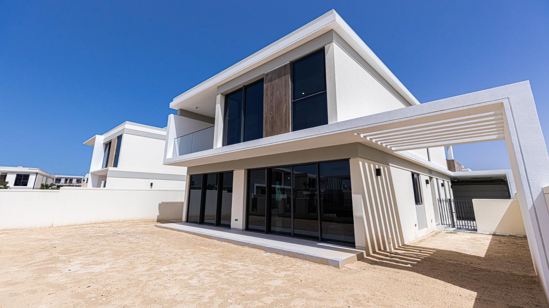 Front view of modern 4-bedroom Harmony Villa for sale in Tilal Al Ghaf