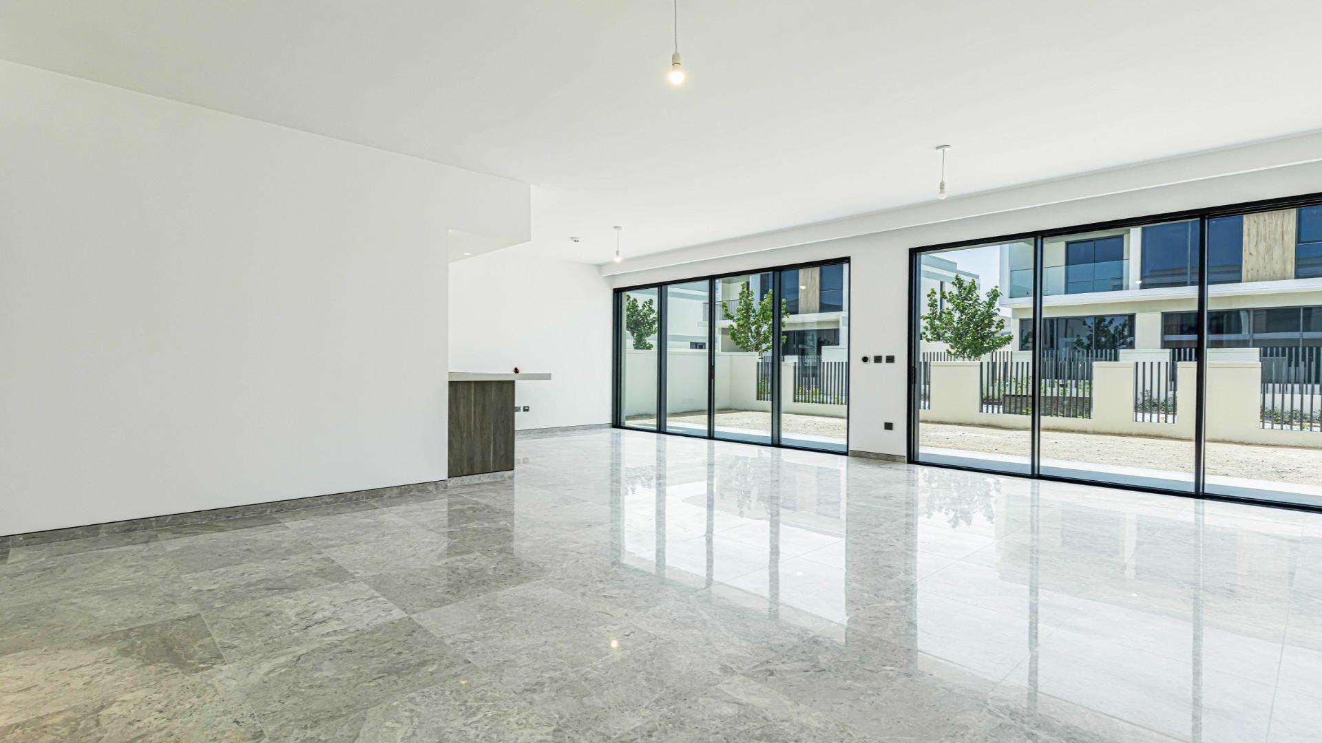 Modern four-bedroom villa exterior in Harmony 2, Tilal Al Ghaf, available for sale