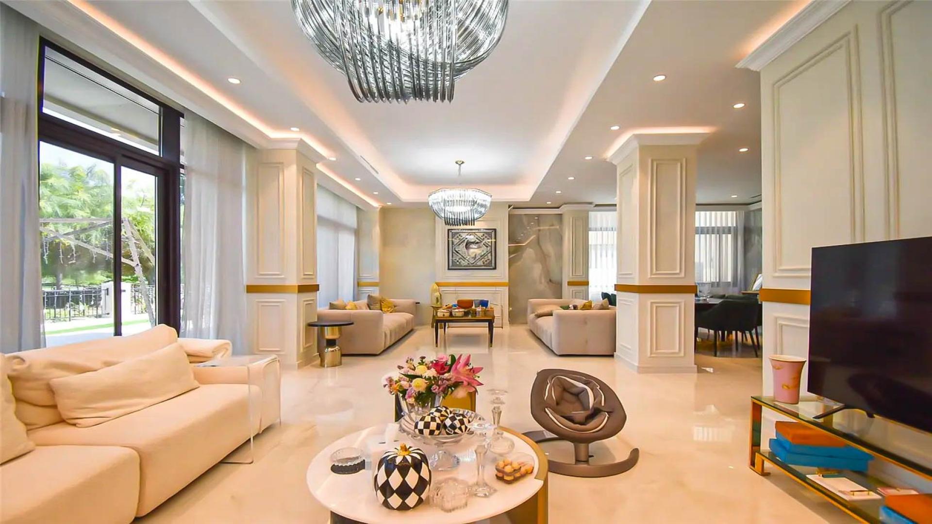 Luxurious living room in upgraded Damac Hills villa with elegant decor and natural light