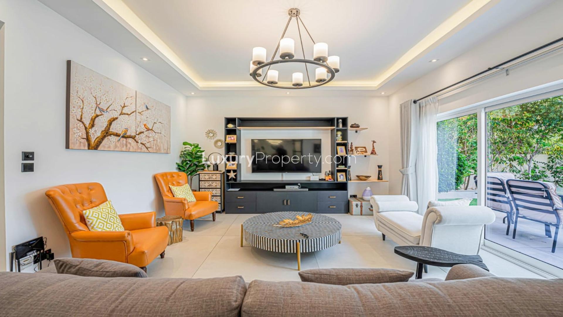 Stylish living room in fully upgraded 4-bedroom Meadows 1 villa for sale