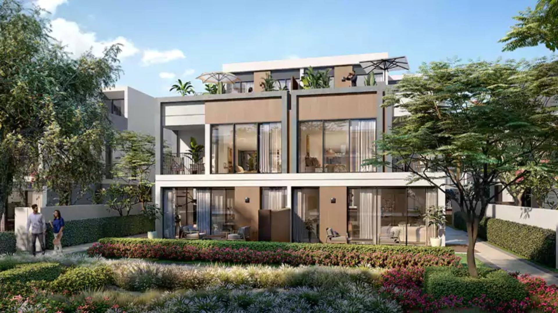 Spacious Aura Villa in Tilal Al Ghaf with pool and lush greenery