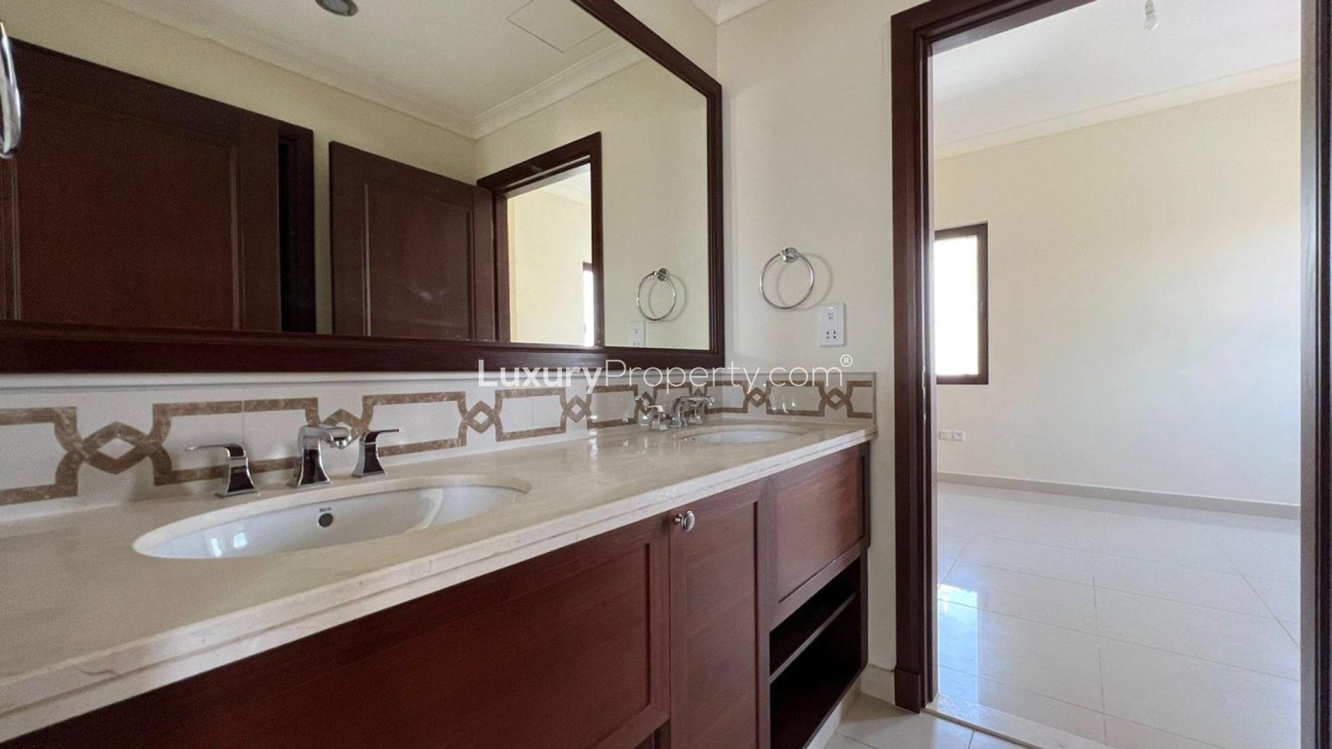 Empty bedroom with wooden closet in Rosa Villa, Arabian Ranches 2, for sale