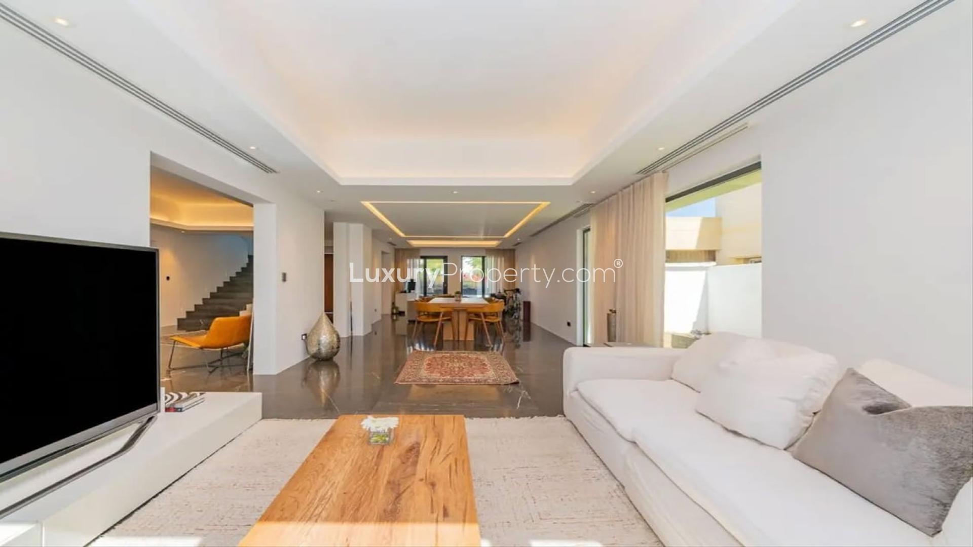 Luxurious Meadows 8 villa living room with pool view, spacious and modern design