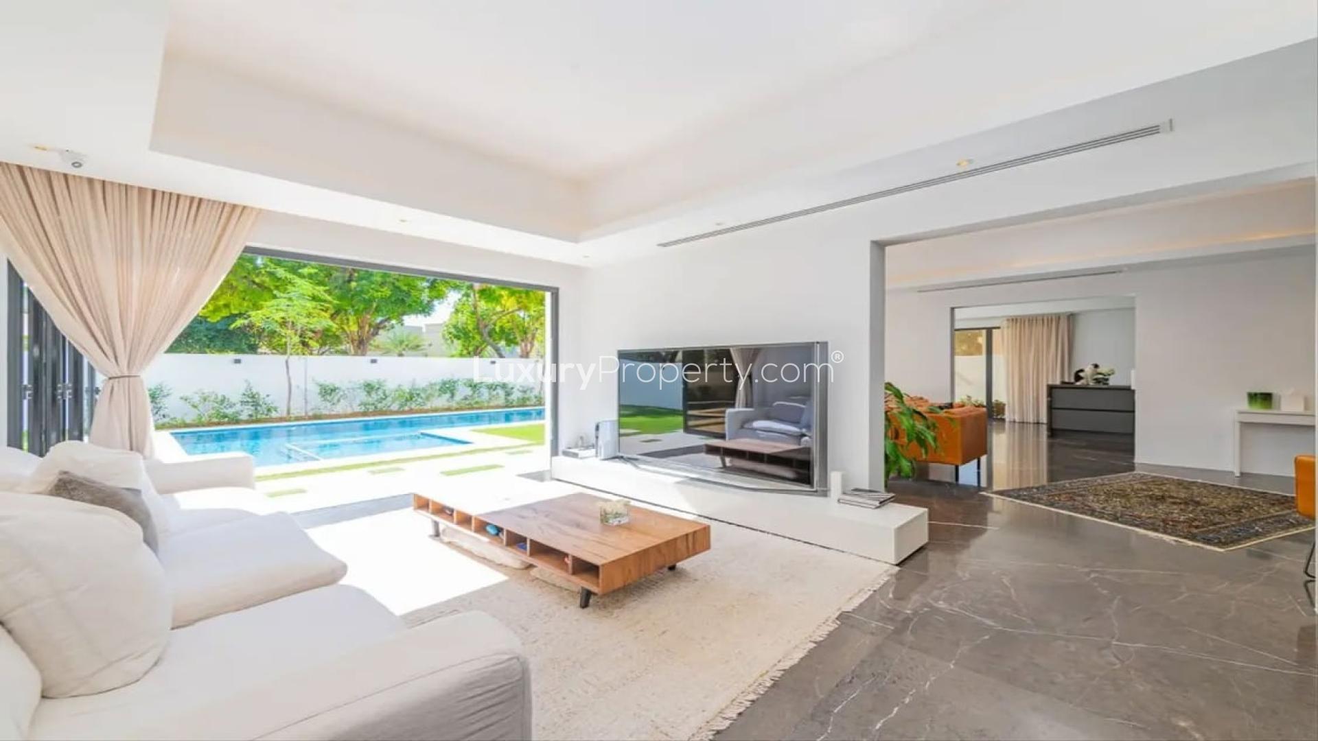 Luxurious Type 11 villa with illuminated pool in Meadows 8, prime location for sale