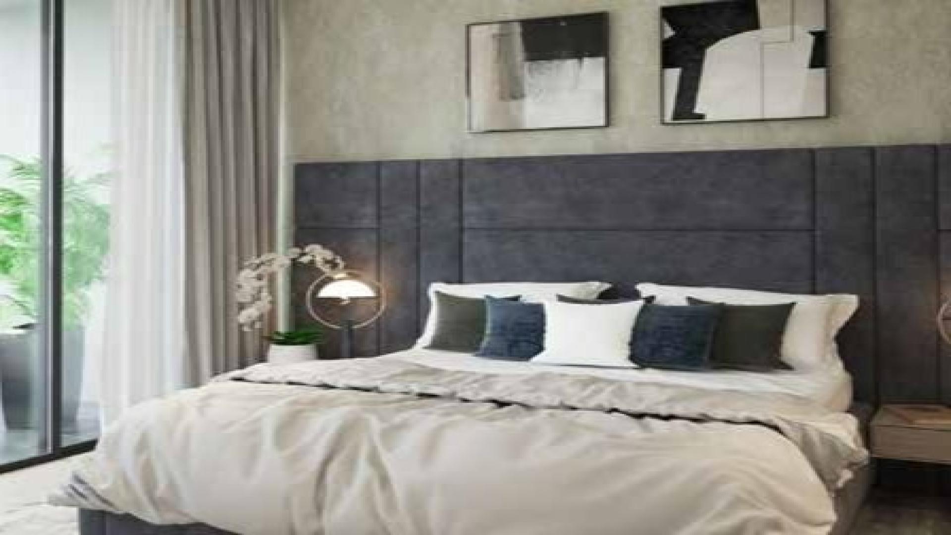 Modern living area in 4-bedroom villa, Damac Hills, Silver Springs, open-plan design, luxury interiors