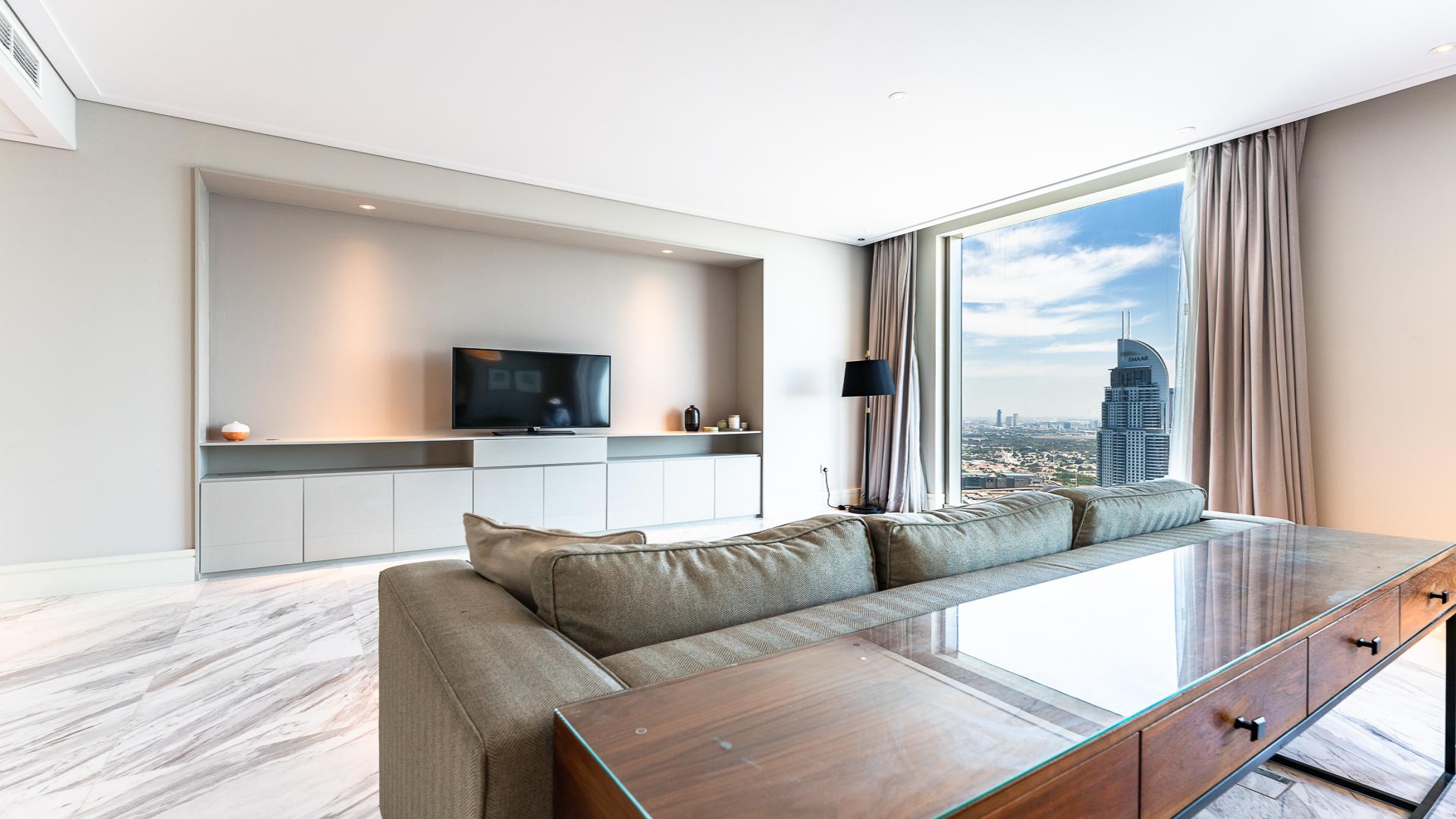 Luxury 4-bedroom apartment with Burj view, spacious living area, Downtown Dubai rental