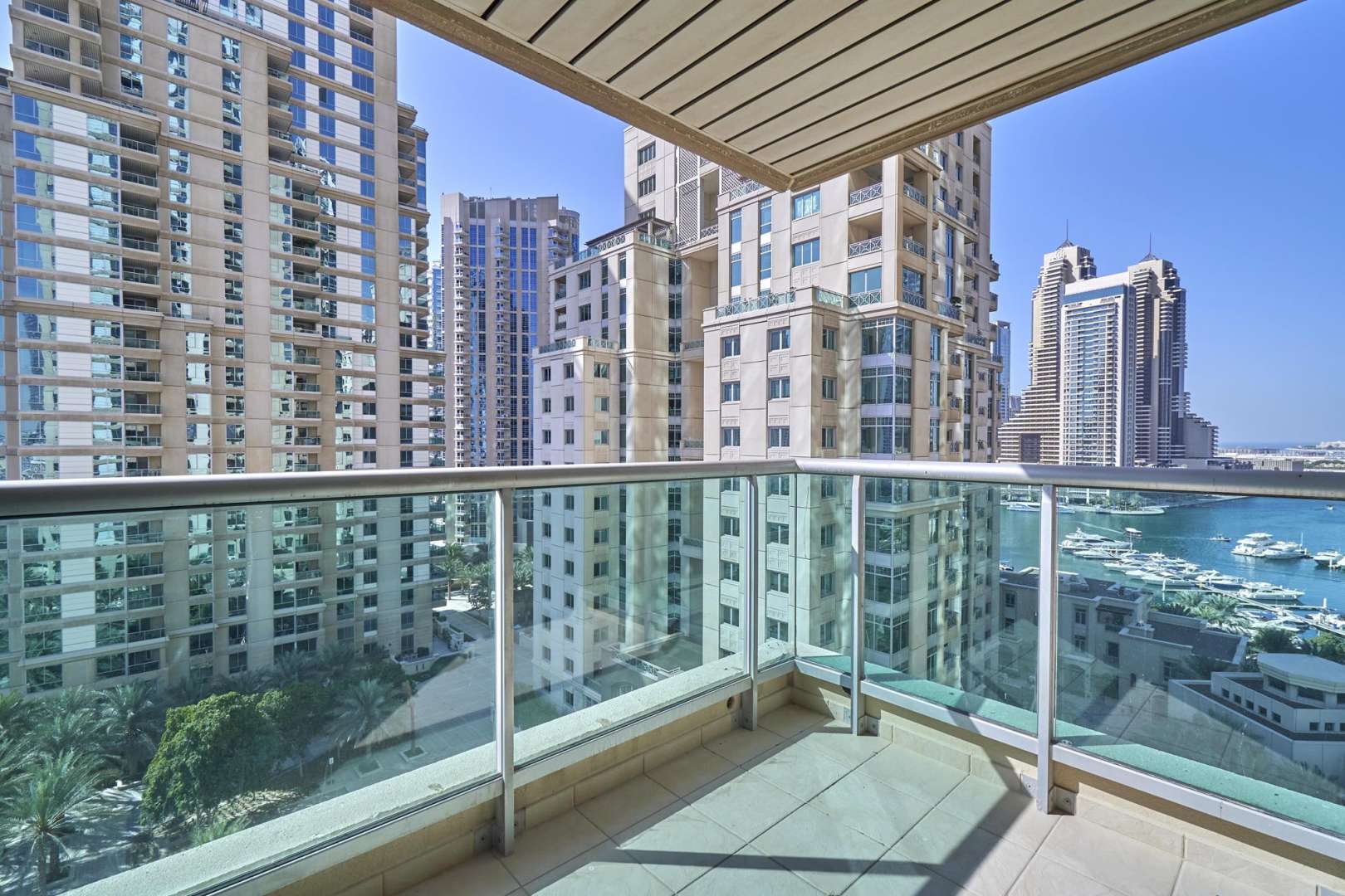 Spacious living room in luxury 4-bedroom apartment, Al Mesk, Dubai Marina, with city view