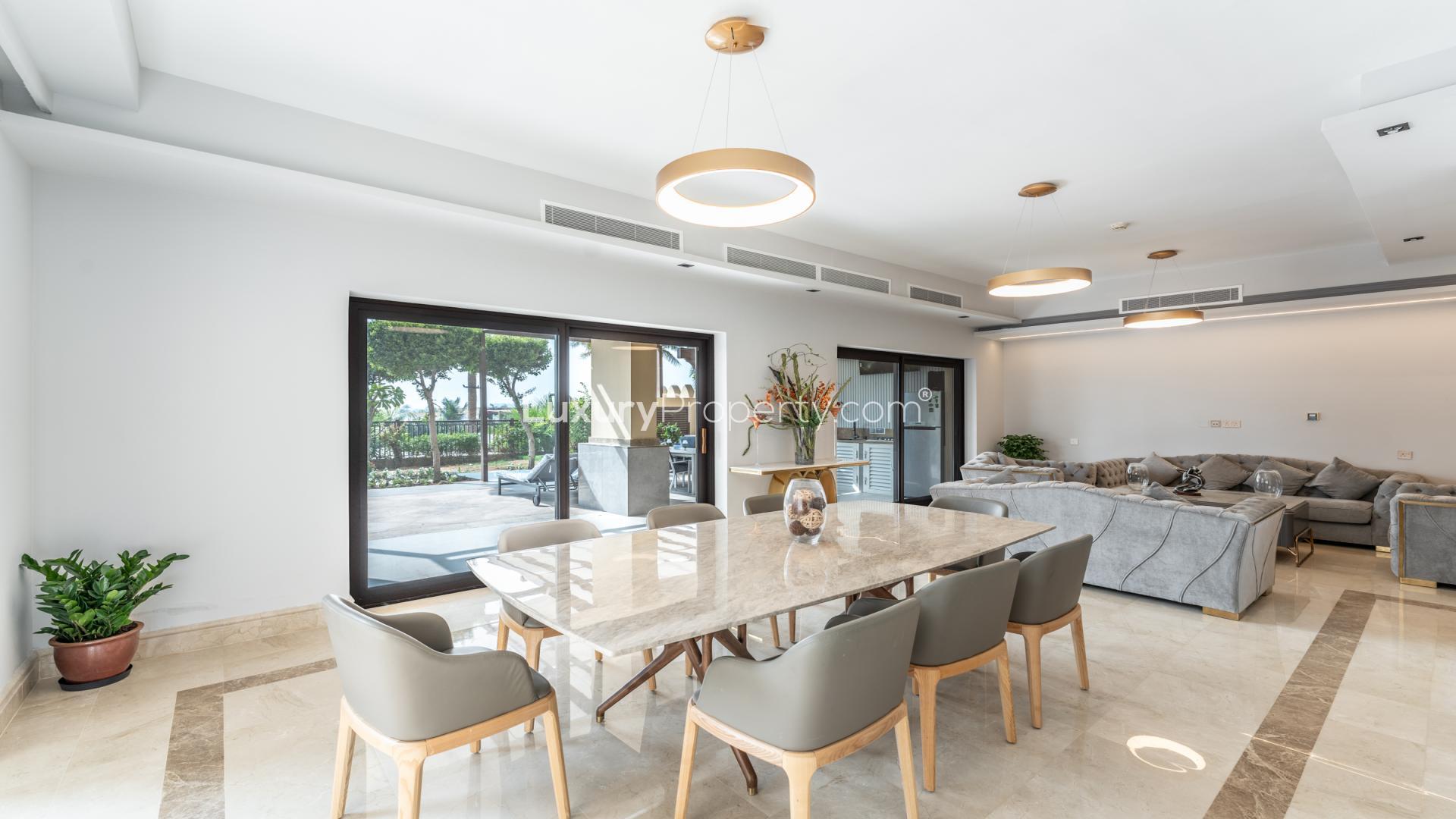 Luxurious Palm Jumeirah apartment living room with modern decor and elegant furnishings