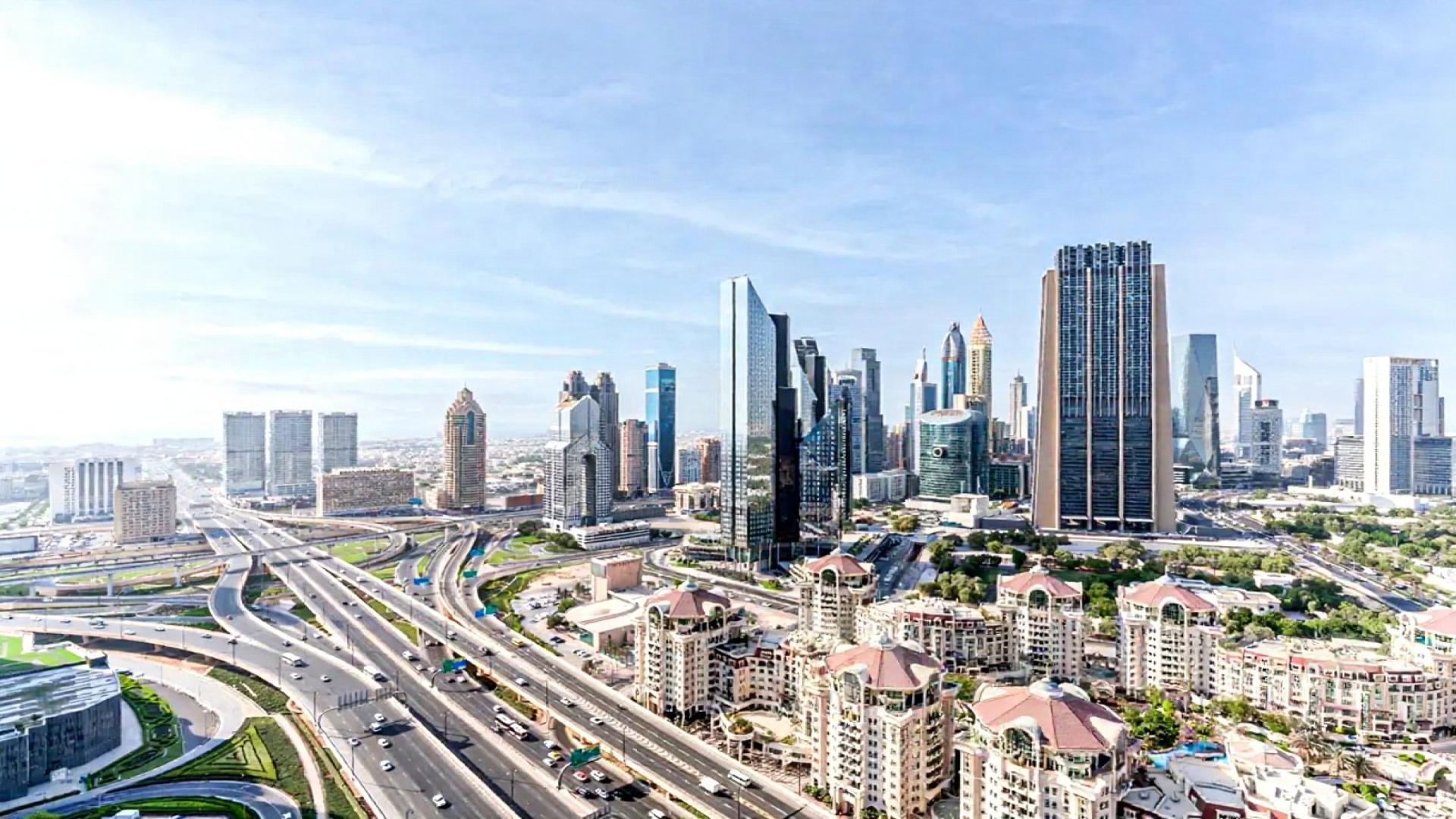 Modern kitchen with sleek appliances in The Address BLVD Sky Collection apartment