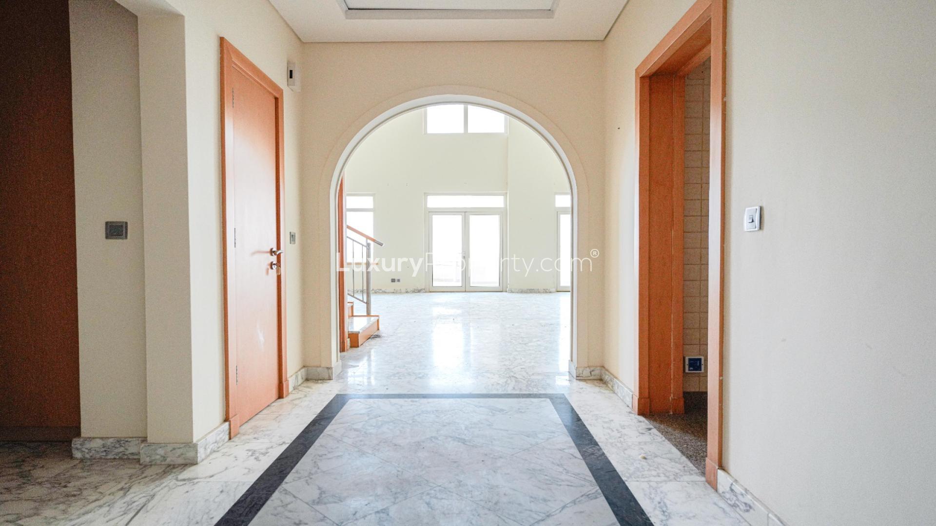 Duplex penthouse living area with high ceilings and sea views, Shoreline Apartments, Palm Jumeirah