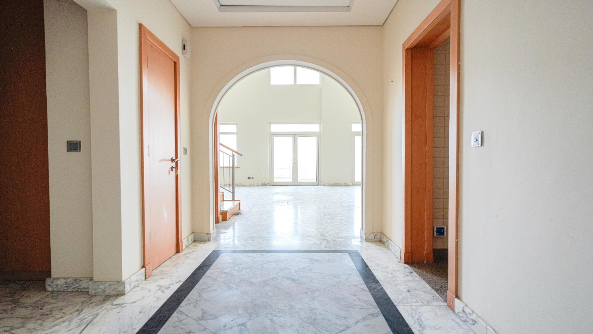 Duplex penthouse living area with high ceilings and sea views, Shoreline Apartments, Palm Jumeirah