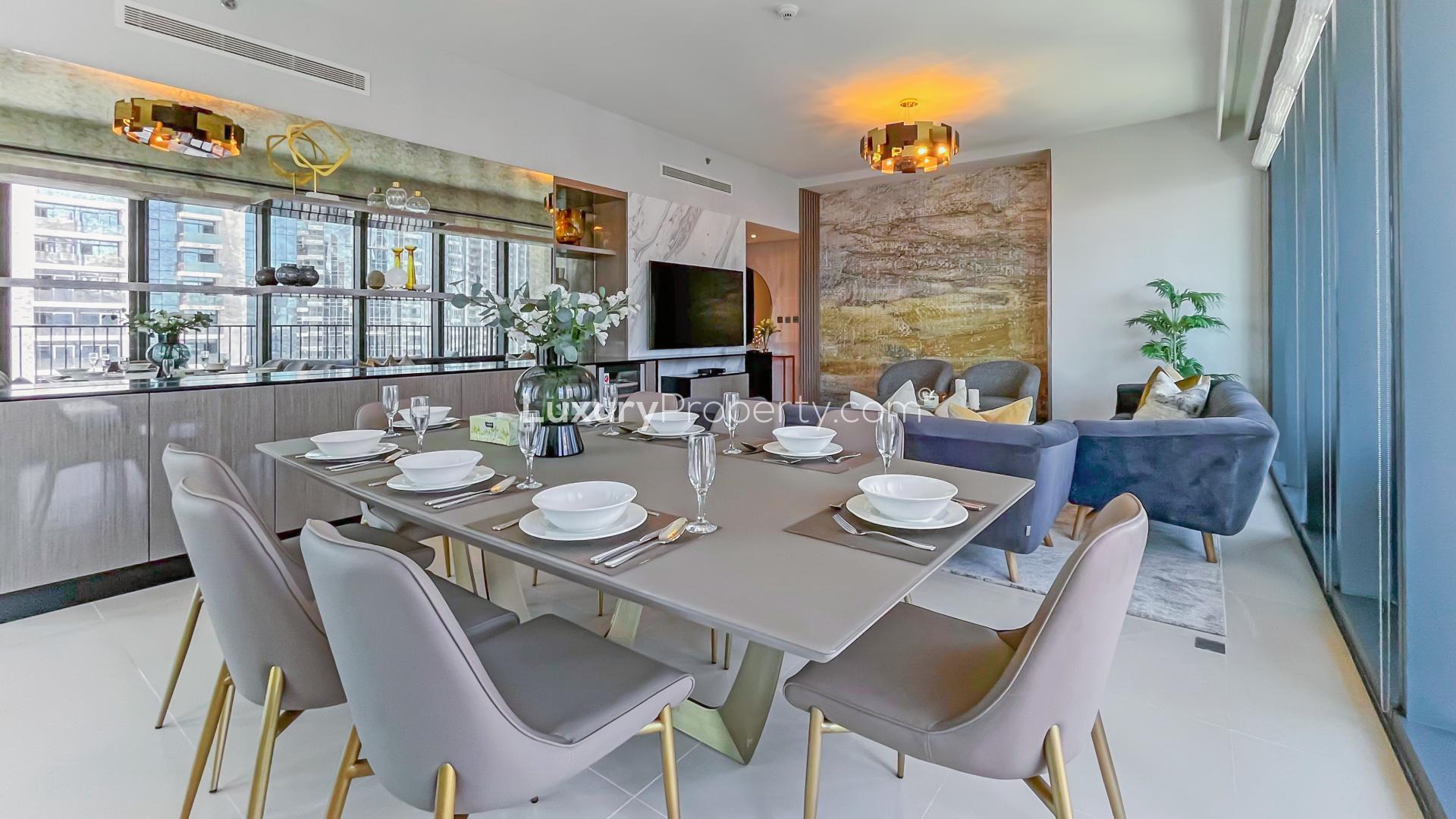 Luxurious living room in Downtown Dubai apartment, modern decor, city views, spacious layout