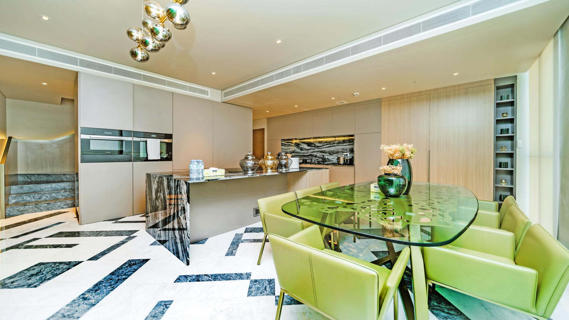 Modern kitchen and dining area in fully upgraded 4-bedroom apartment, City Walk
