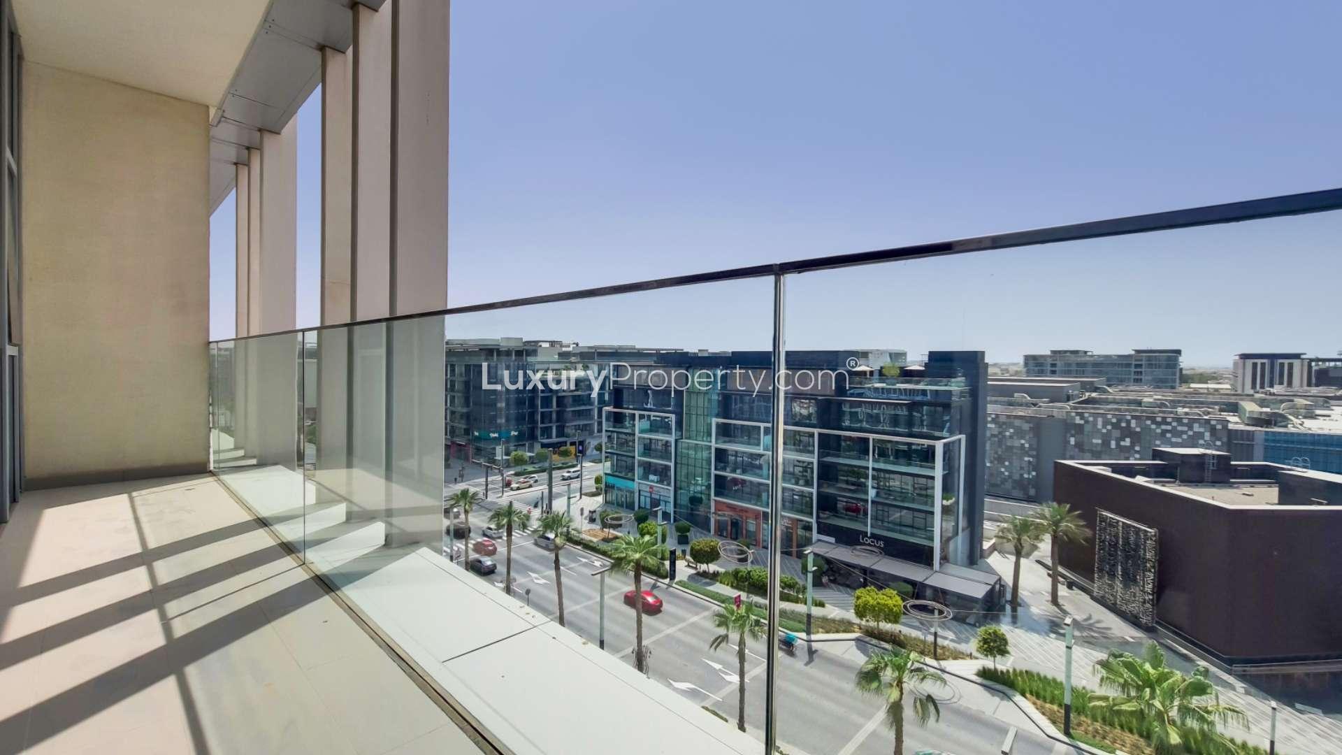 Spacious living area in City Walk penthouse with floor-to-ceiling windows and hardwood floors