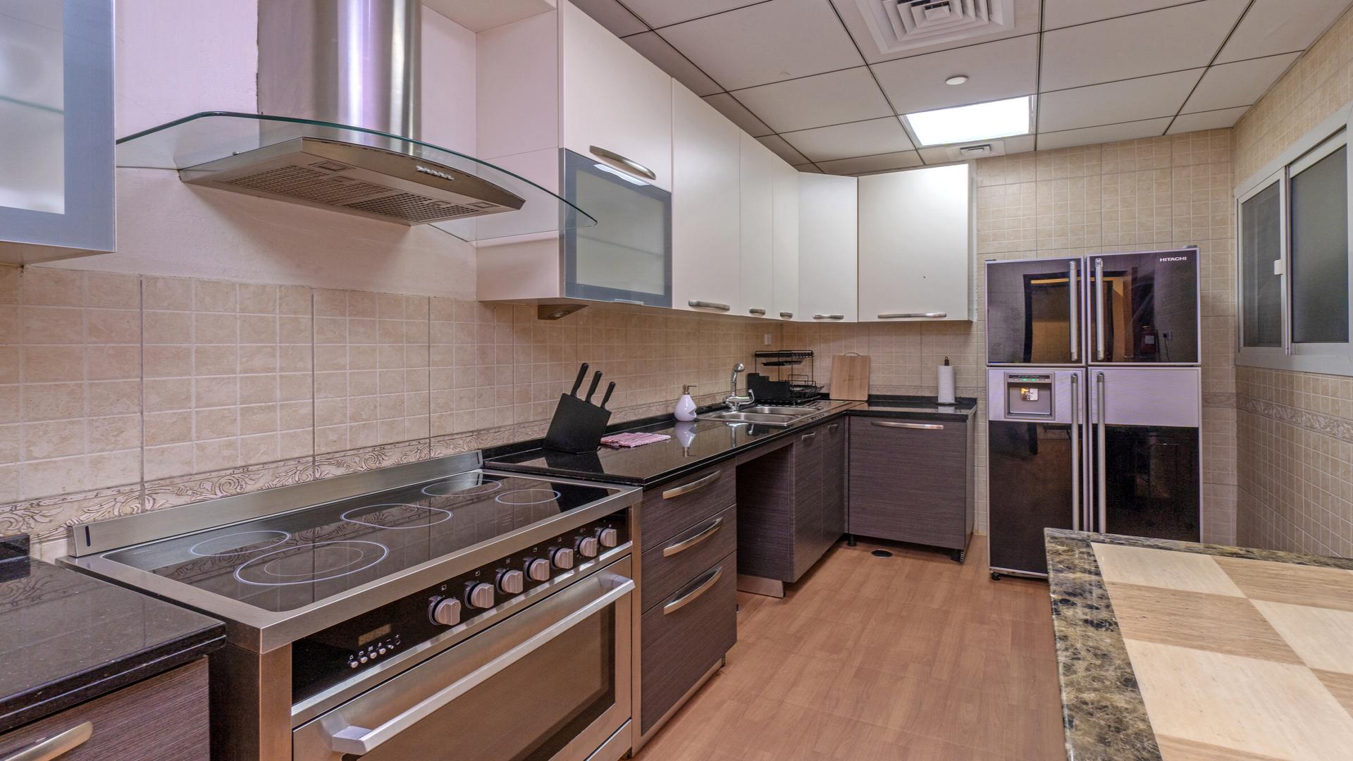 Dining area in luxury 4-bedroom apartment, Horizon Tower, Dubai Marina. Modern decor, elegant setting