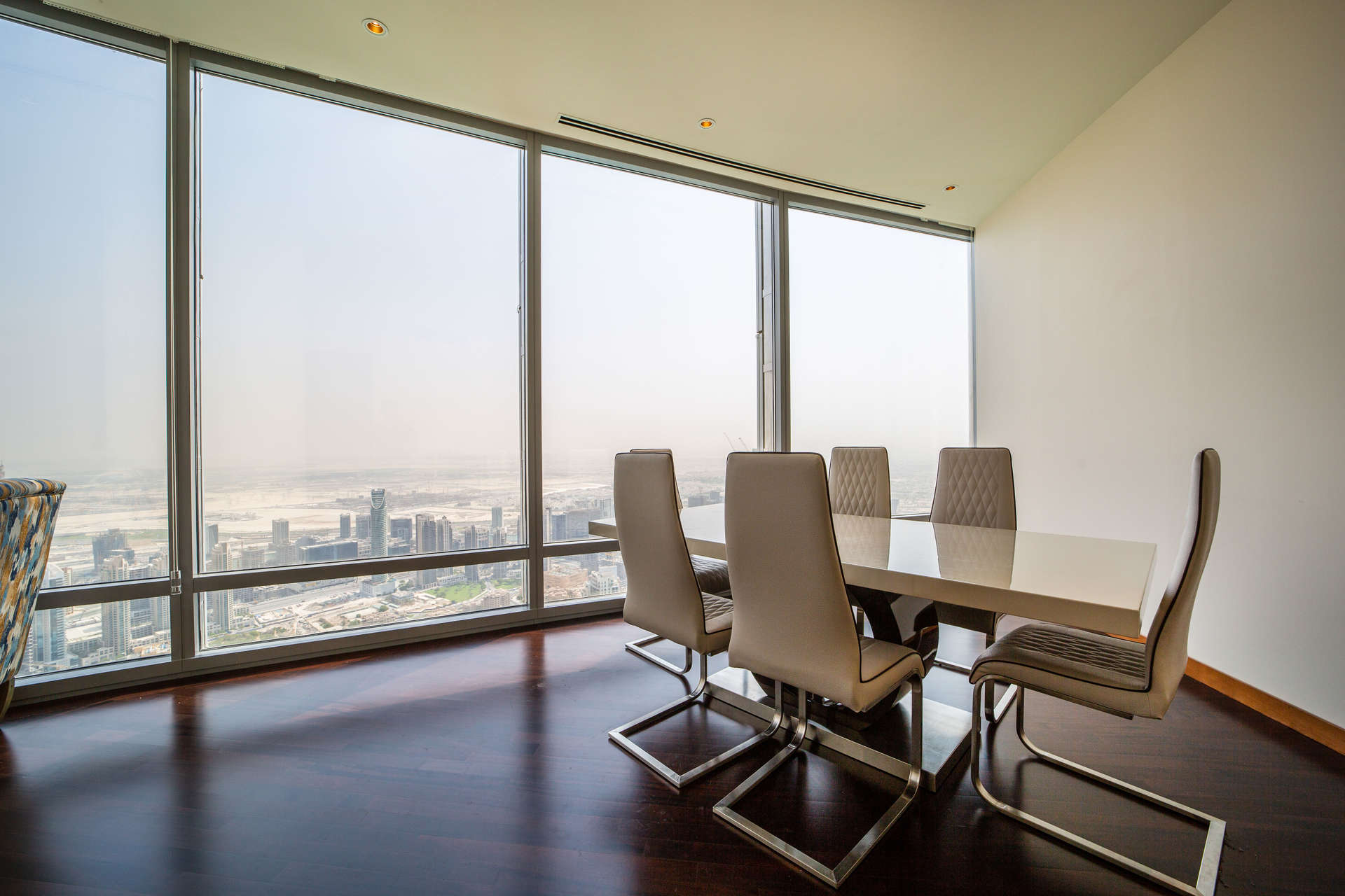 Luxurious kitchen in high-floor Burj Khalifa apartment, featuring modern cabinets and granite countertops