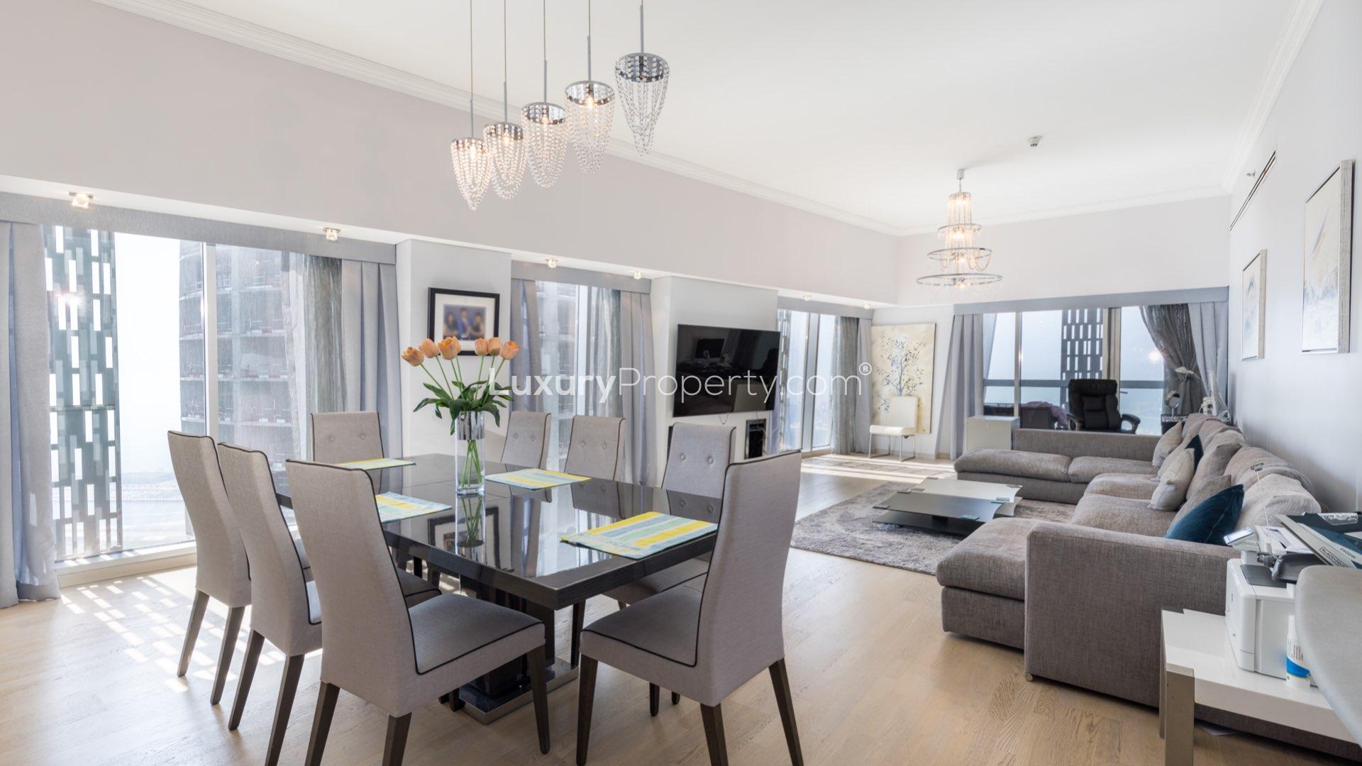 Luxurious living room in upgraded 4-bedroom Cayan Tower apartment, Dubai Marina, high floor