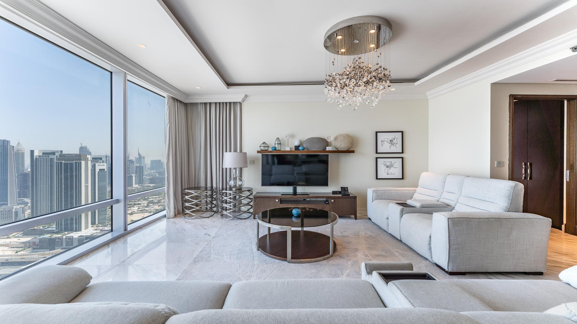 Balcony view of Burj Khalifa and Dubai Fountain from luxury duplex in Downtown Dubai