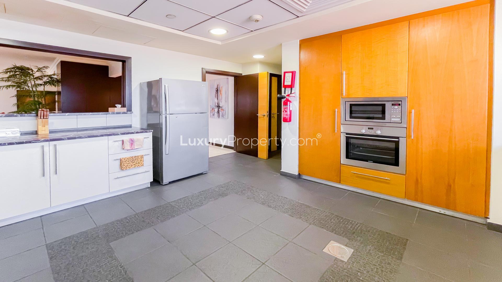 Spacious living and dining area in Murjan apartment with marina view, Jumeirah Beach Residence