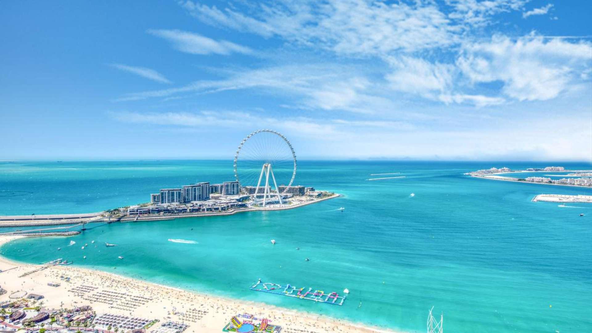 Luxurious penthouse living room with sea views, modern furniture, and large windows in Jumeirah Beach Residence