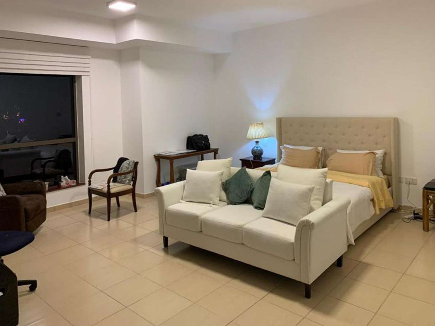 Interior view of 4-bedroom apartment in JBR, featuring elegant decor and open kitchen