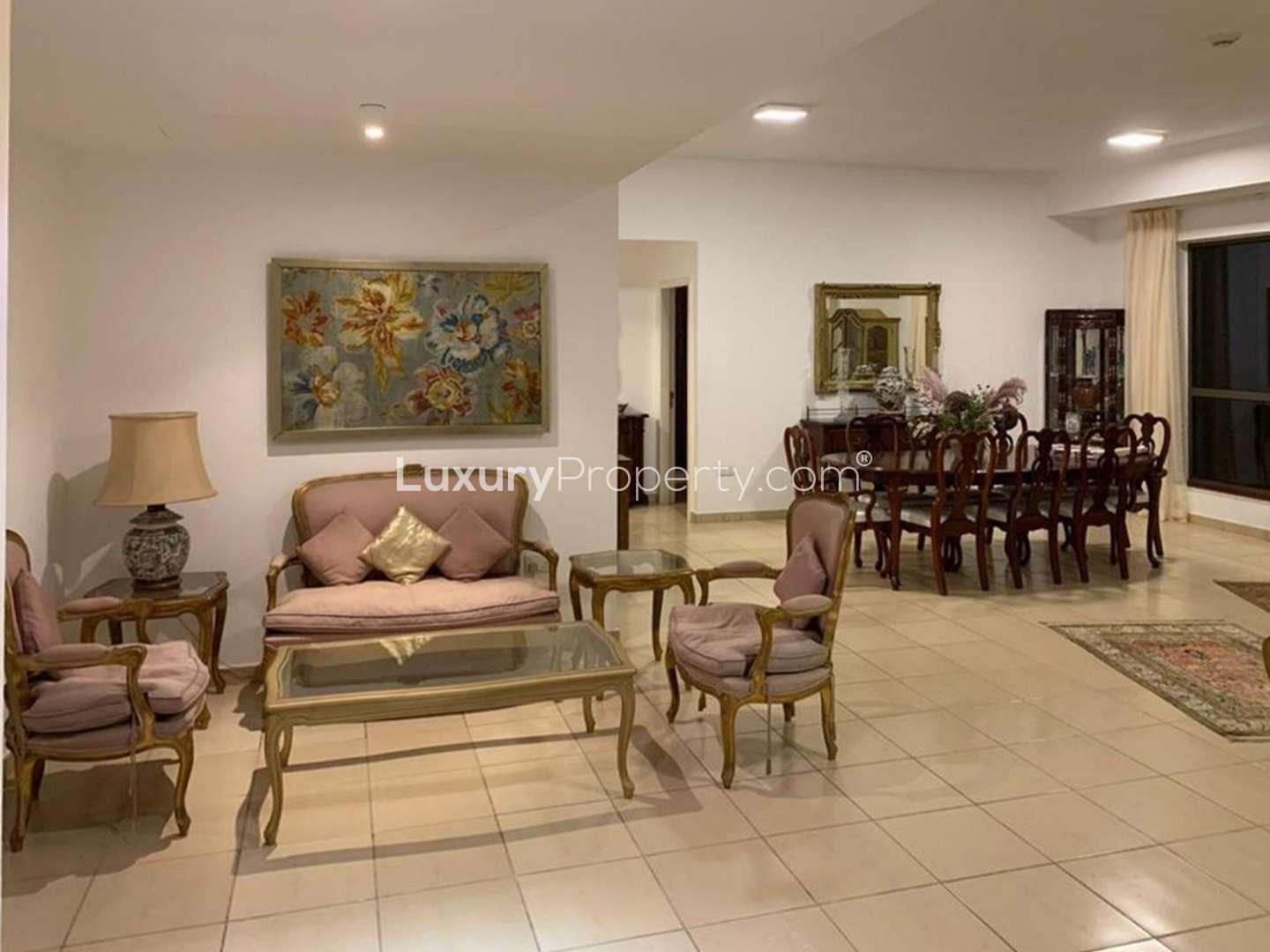 Spacious living room in 4-bedroom JBR apartment, elegant furniture, Rimal sub-community