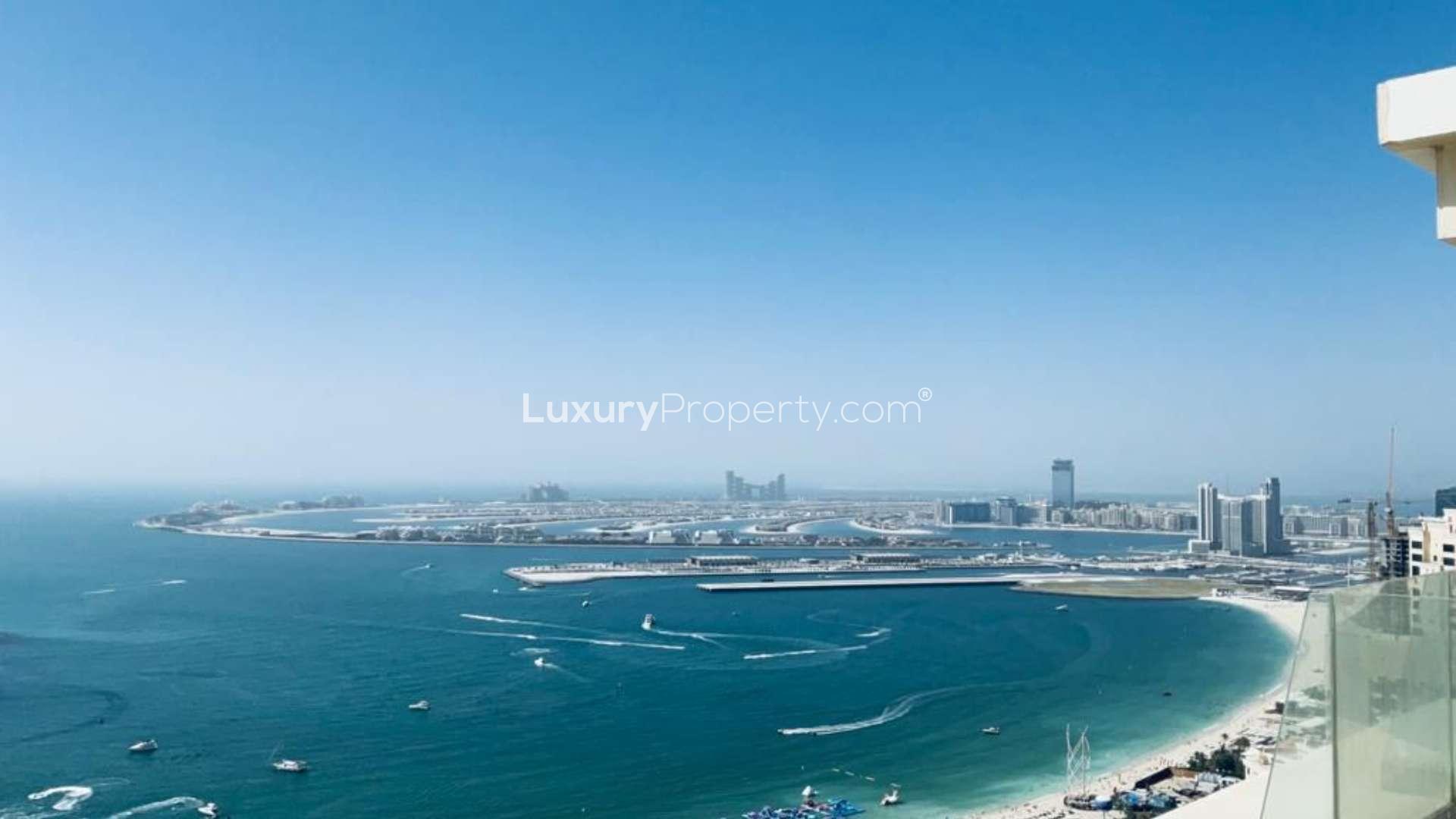Elegant dining area in fully upgraded Jumeirah Beach Residence penthouse with modern decor