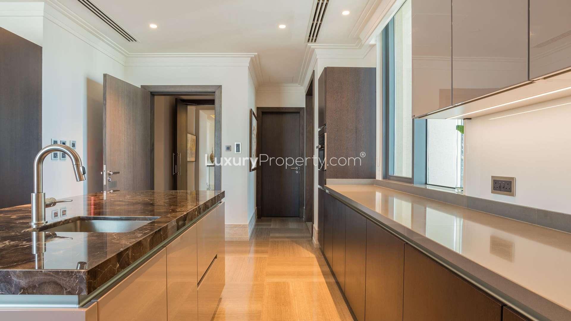 Luxury kitchen in 4-bedroom penthouse at The 118, Downtown Dubai, with modern finishes