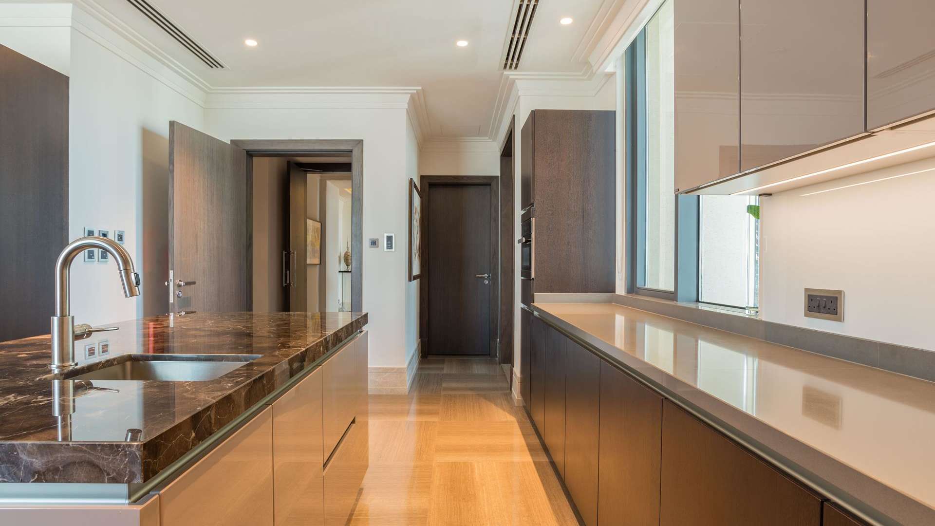 Luxury kitchen in 4-bedroom penthouse at The 118, Downtown Dubai, with modern finishes