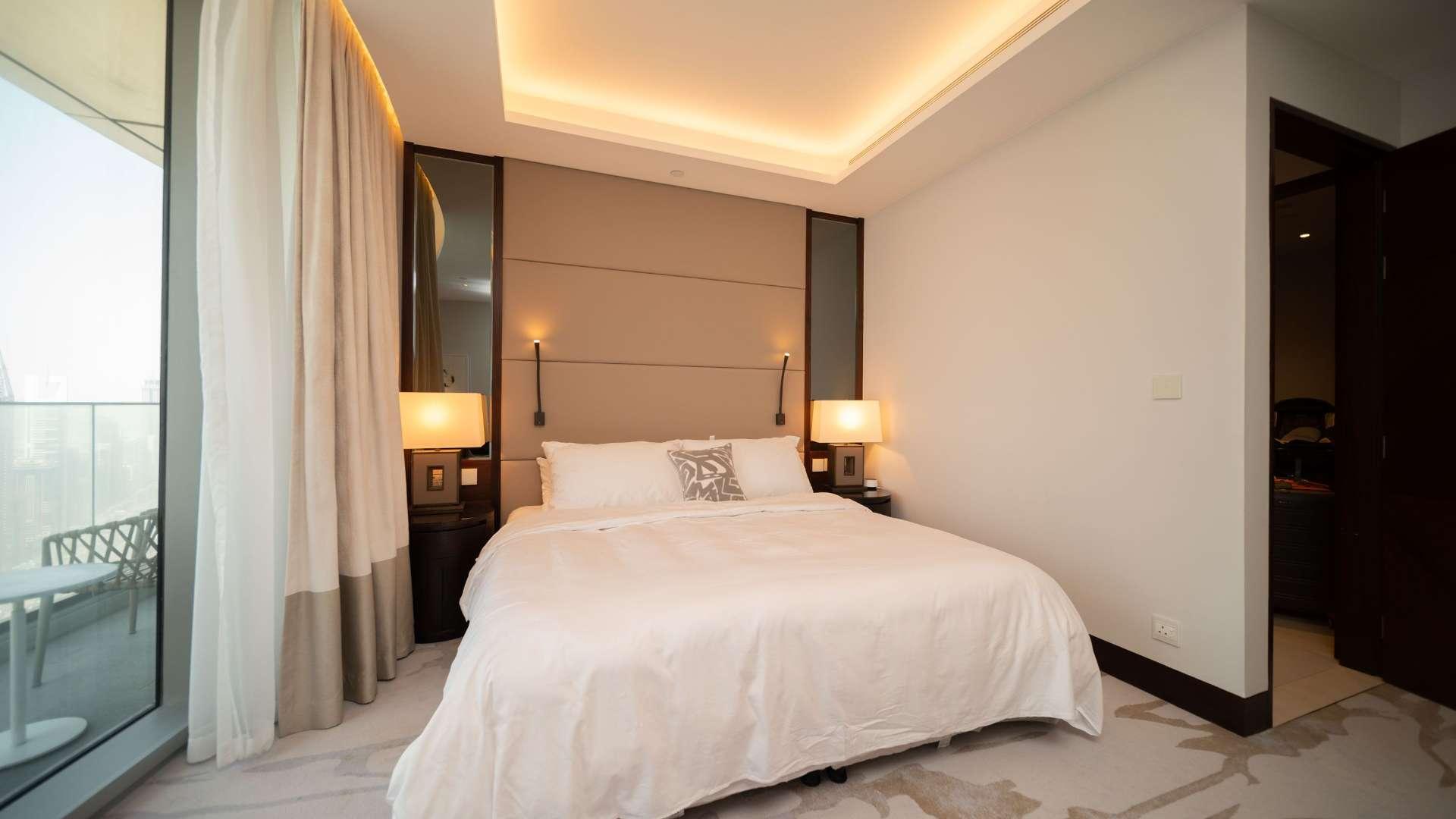 High-floor furnished bedroom with balcony view at The Address Sky View Towers, Downtown Dubai