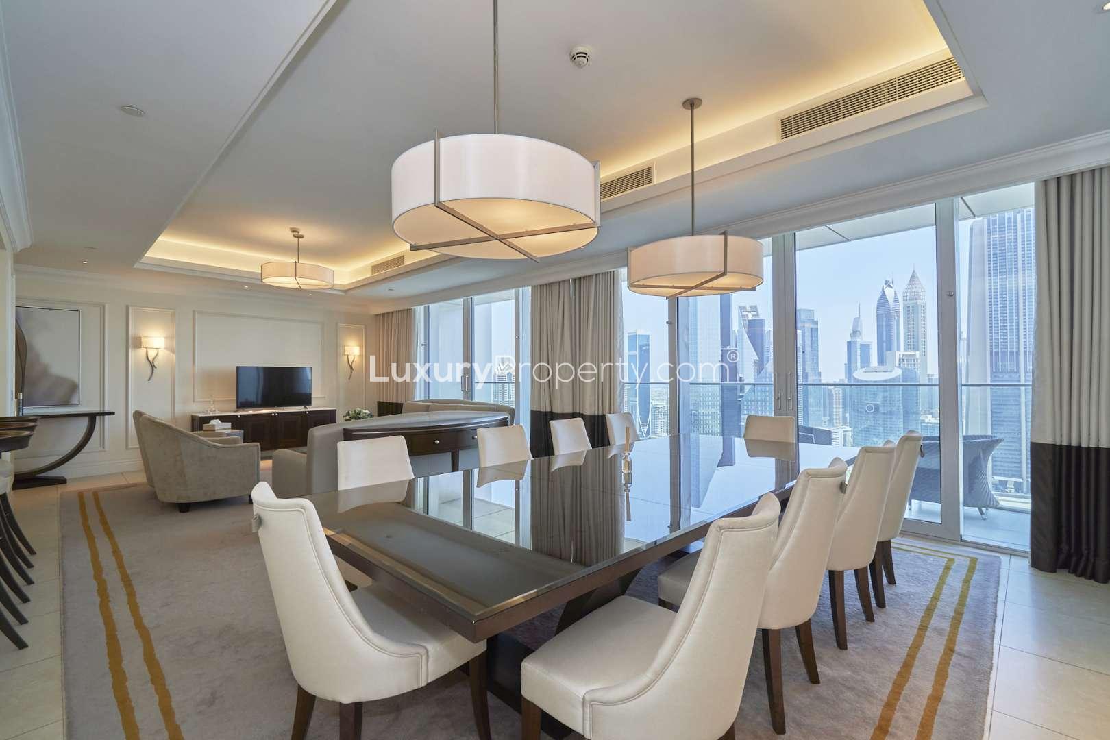 Luxurious dining and living area in four-bedroom apartment, The Address The Blvd, Dubai