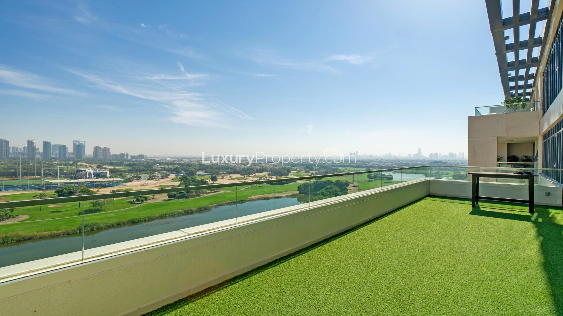 Luxurious Vida Residence duplex with stunning golf course views in The Hills community