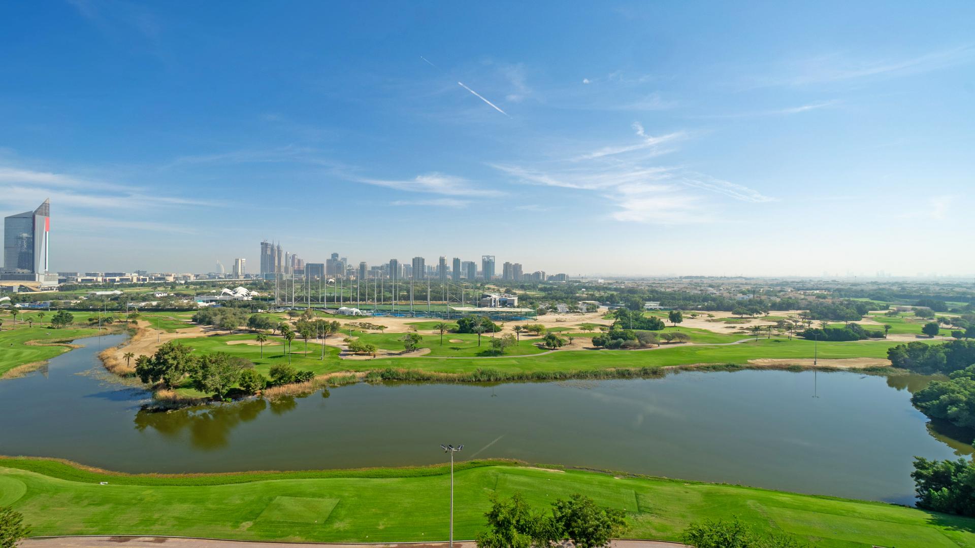Luxurious open-plan living area with golf course views in Vida Residence, The Hills
