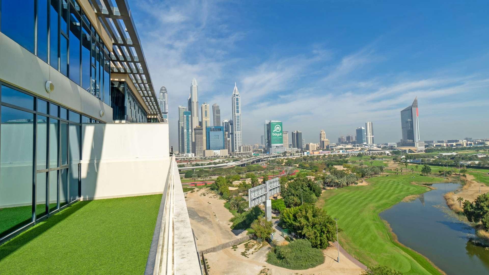 Luxurious Vida Residence duplex balcony with stunning golf course views in The Hills