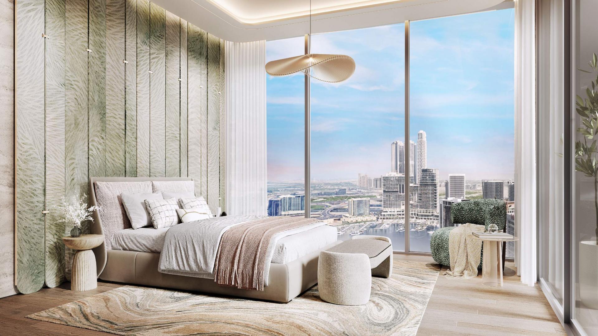 Luxurious bedroom with modern decor and Burj Khalifa view in Downtown Dubai apartment
