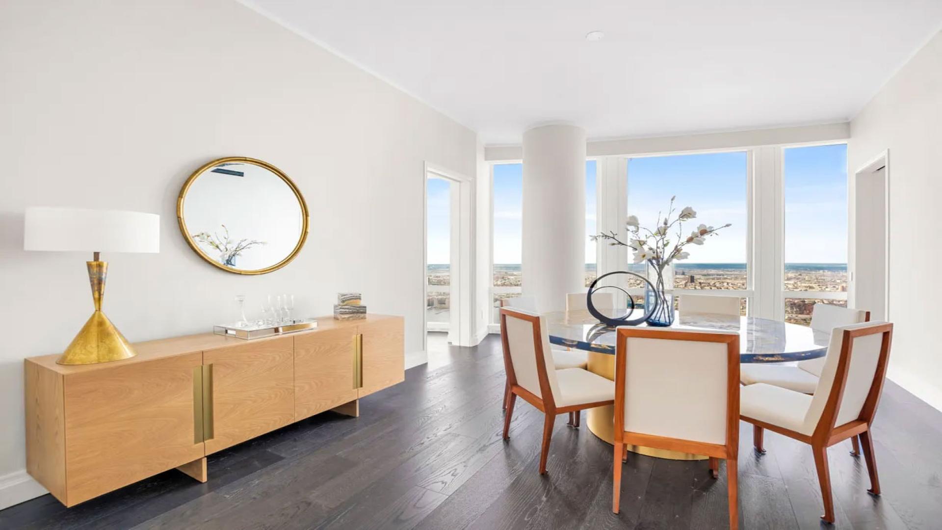 Luxurious bedroom with stunning Hudson River views in 4-bedroom apartment at 35 Hudson Yards