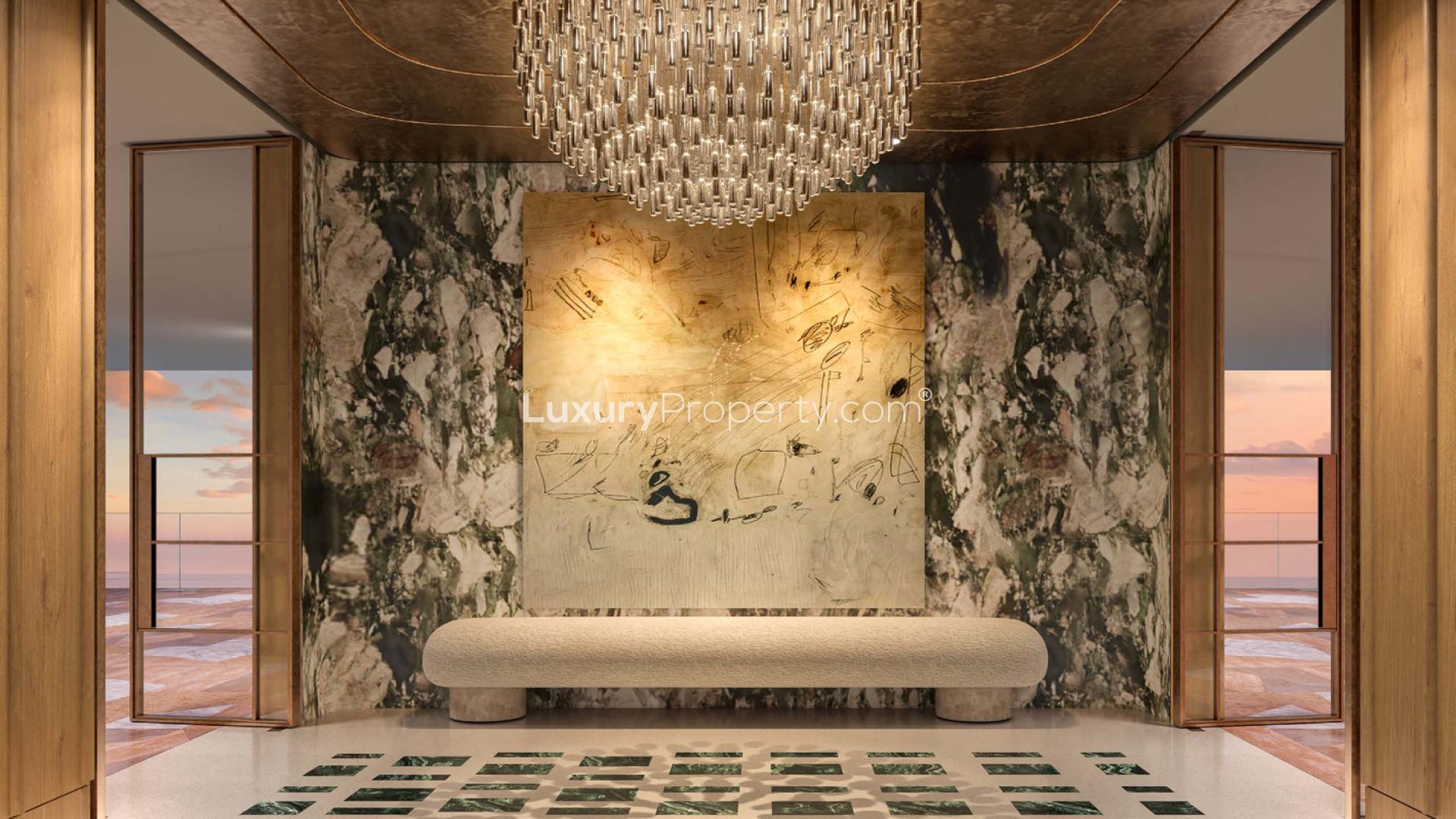 Modern dining area in Jumeirah Asora Bay apartment with ocean view and stylish decor