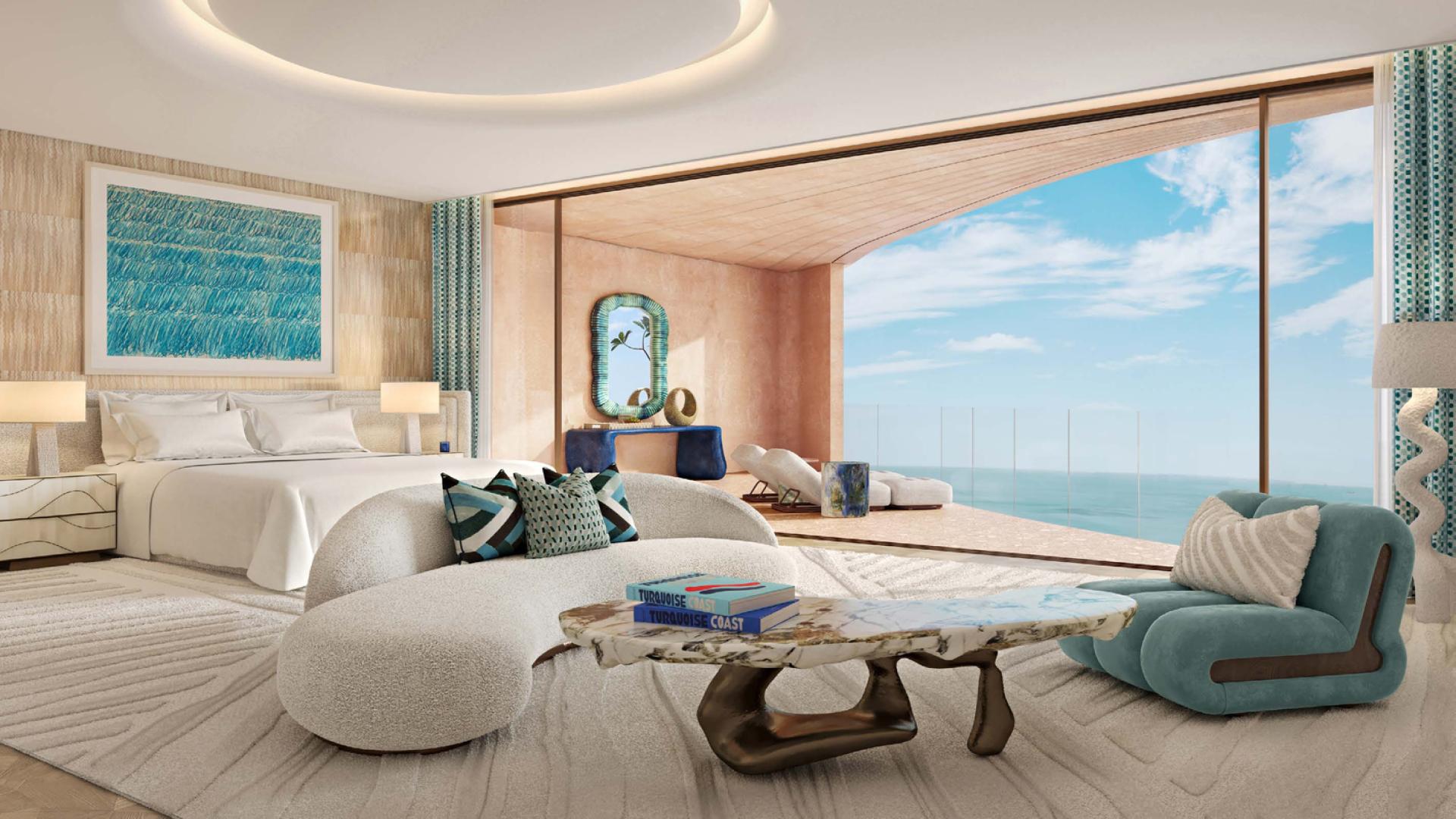 Luxurious lobby in Jumeirah Asora Bay 4-bedroom apartment with elegant chandelier and artwork