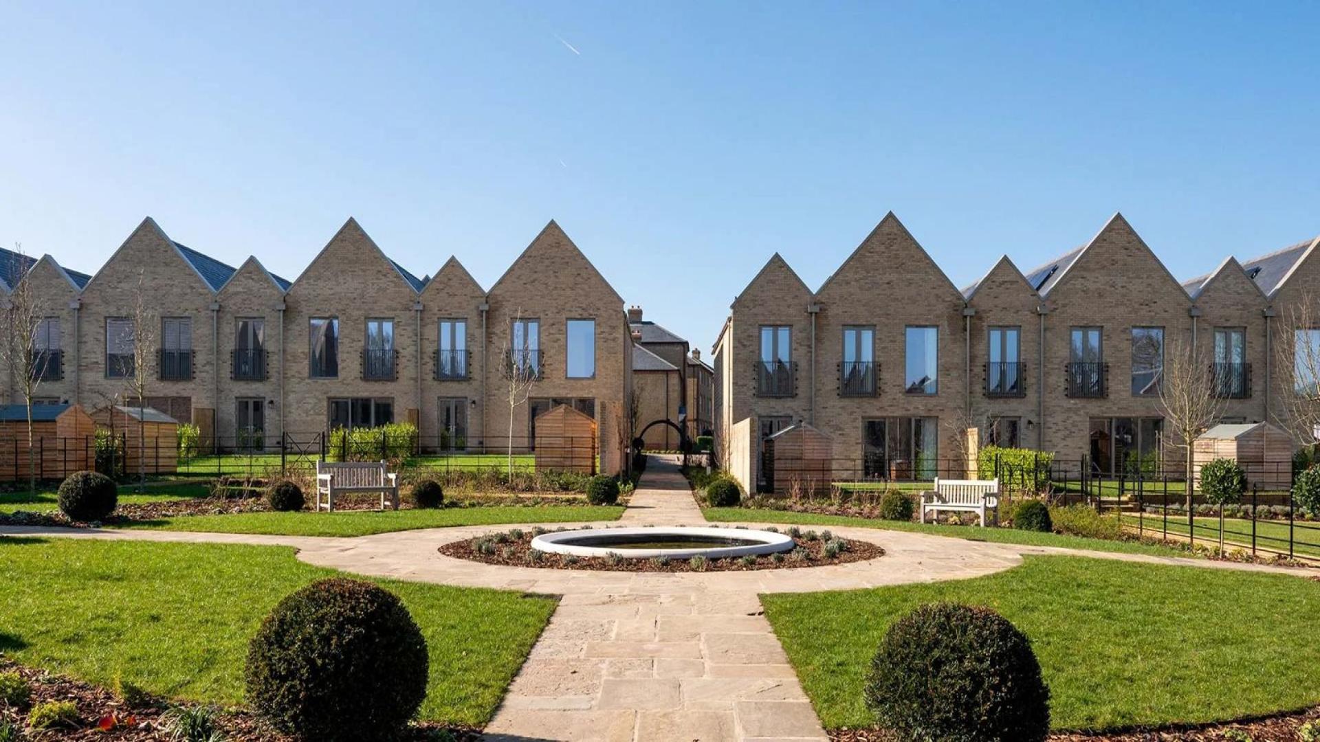 Modern dining area with garden view in Trent Park apartment, London