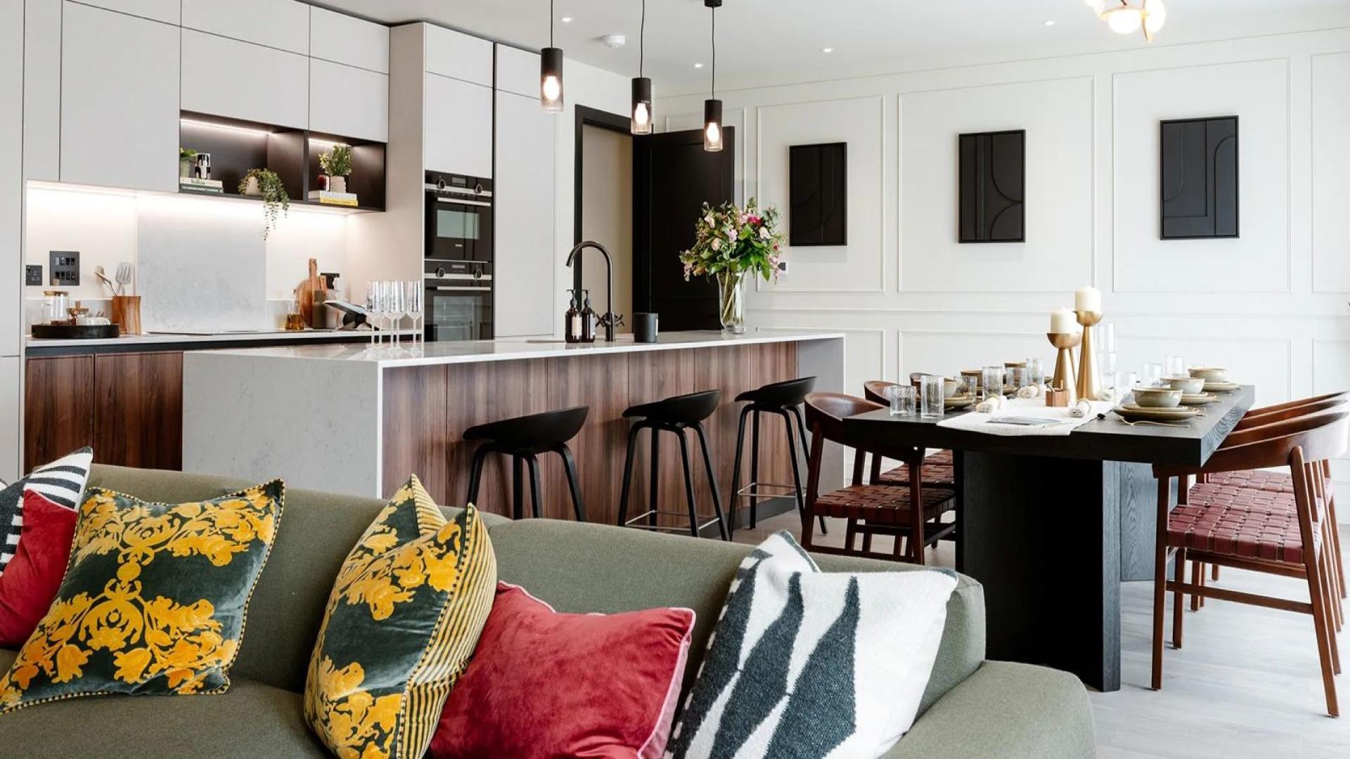 Modern open-plan living area in Trent Park apartment, London, with stylish decor and furnishings