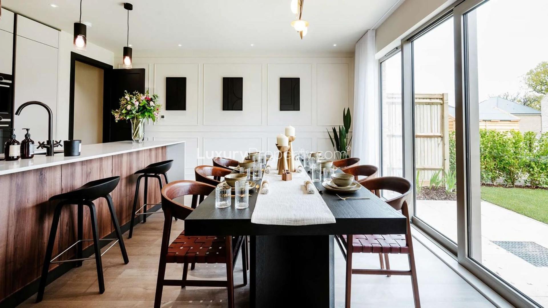 Modern kitchen and dining area in Trent Park, London apartment for sale