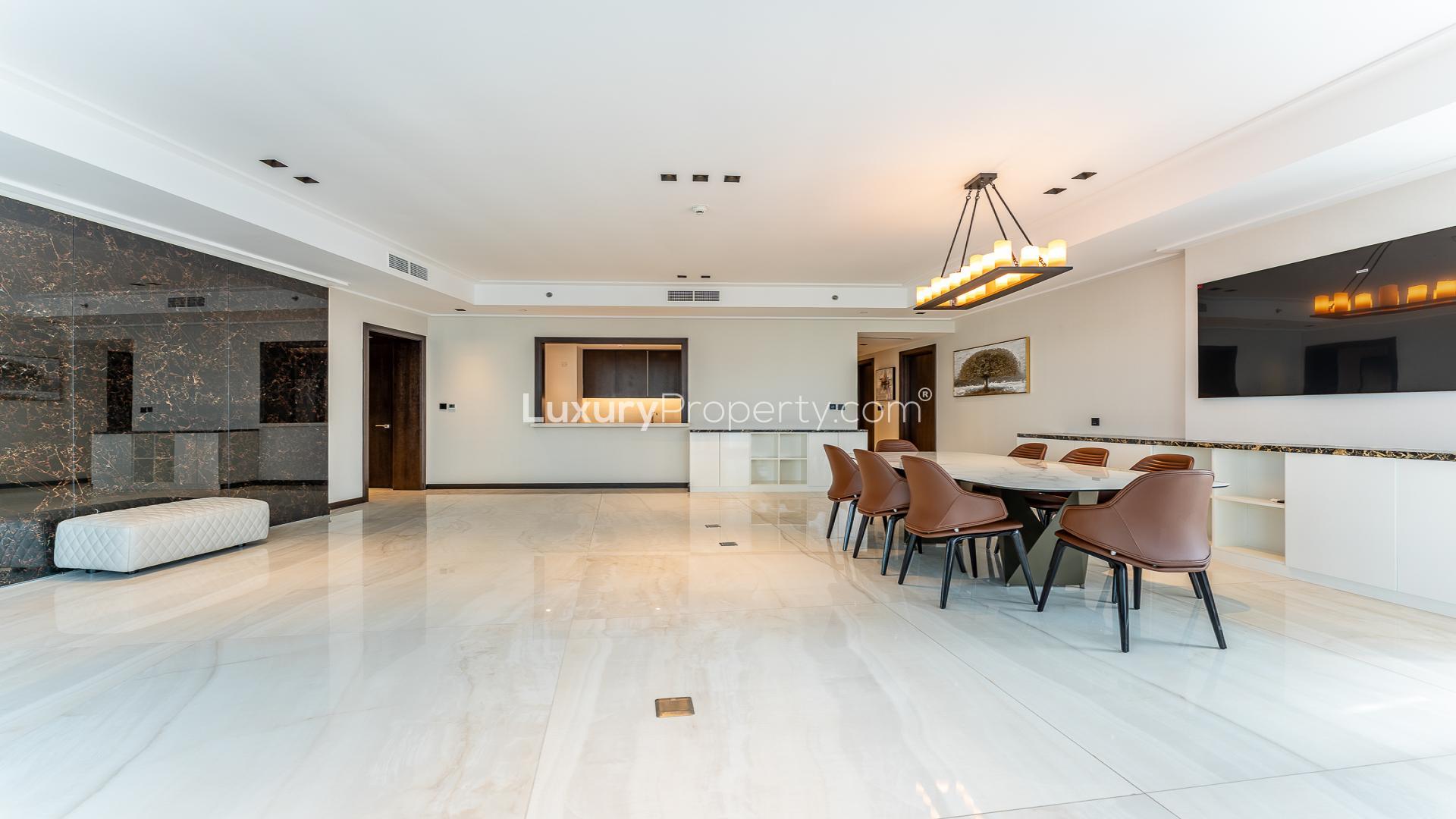 Spacious dining area in four-bedroom apartment, Downtown Dubai, with Burj Khalifa views